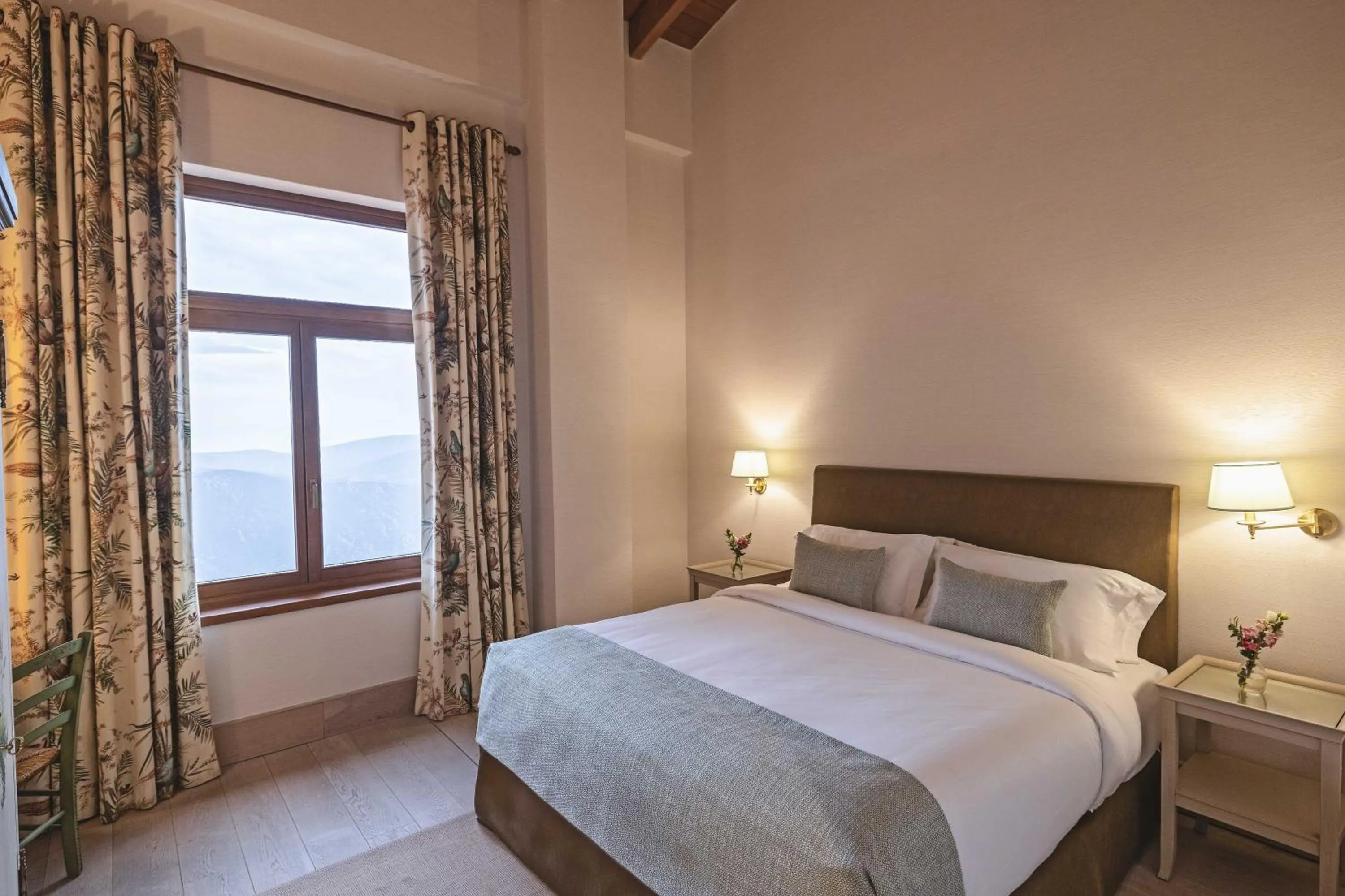 Bed in Santa Marina Arachova Resort & Spa