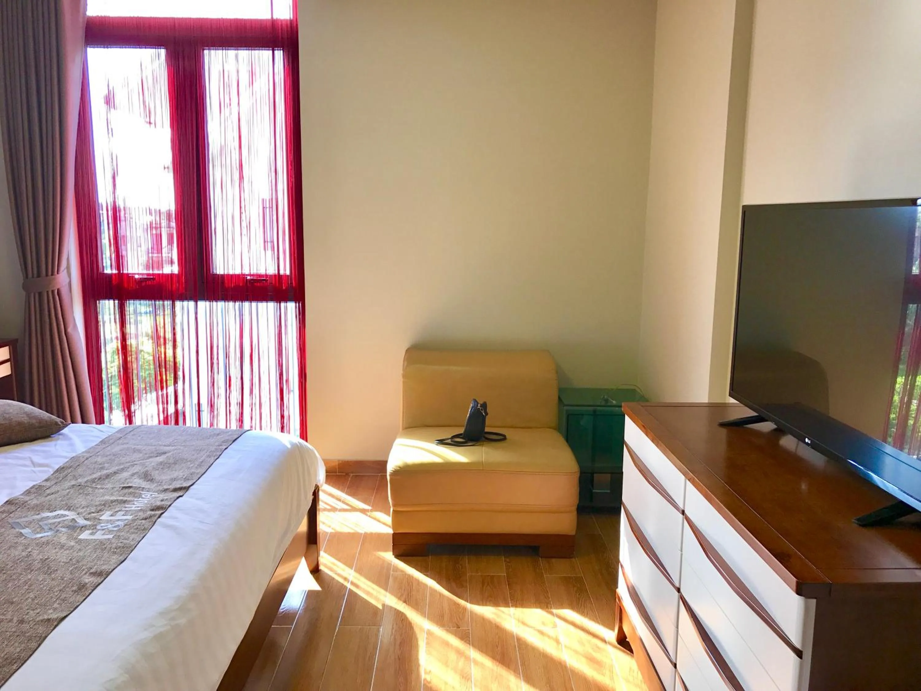 Photo of the whole room, Bed in F & F Hotel