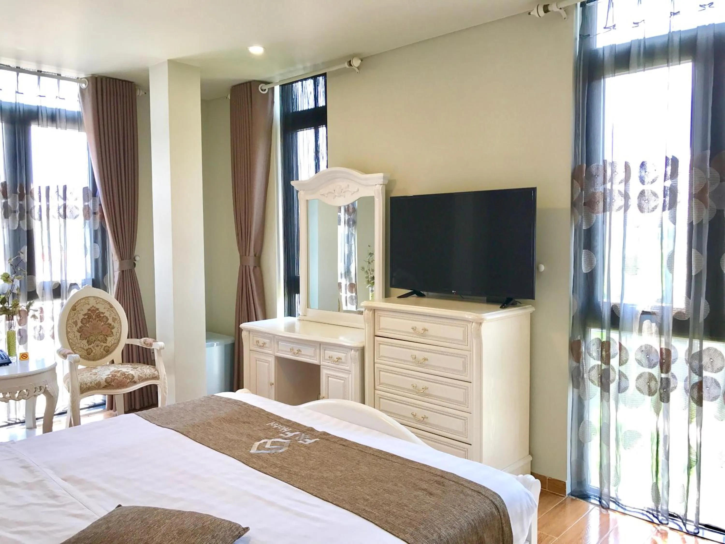 Decorative detail, Bed in F & F Hotel