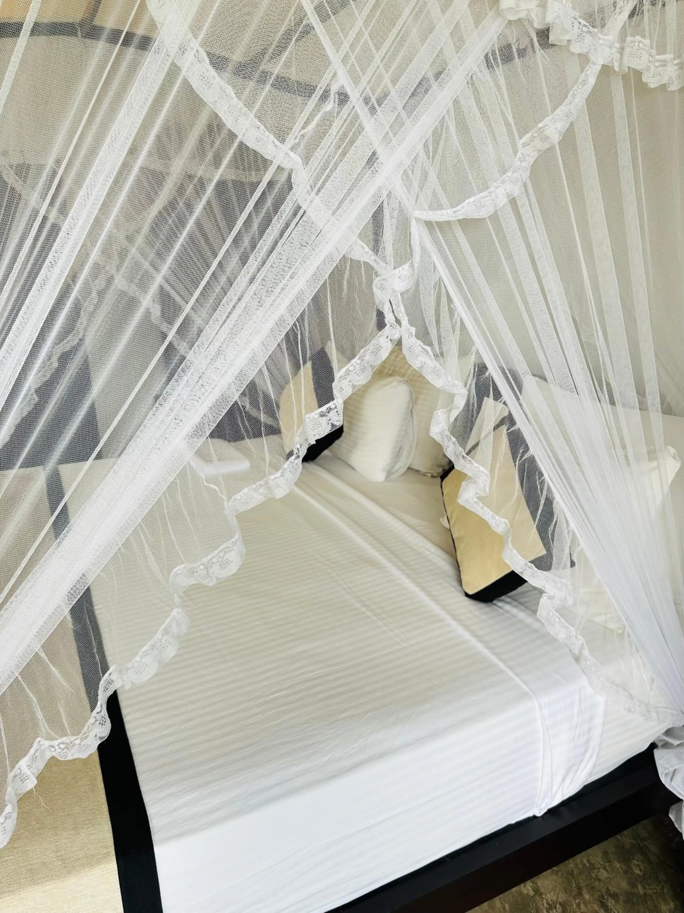 Bed in Mirissa Gate Resort