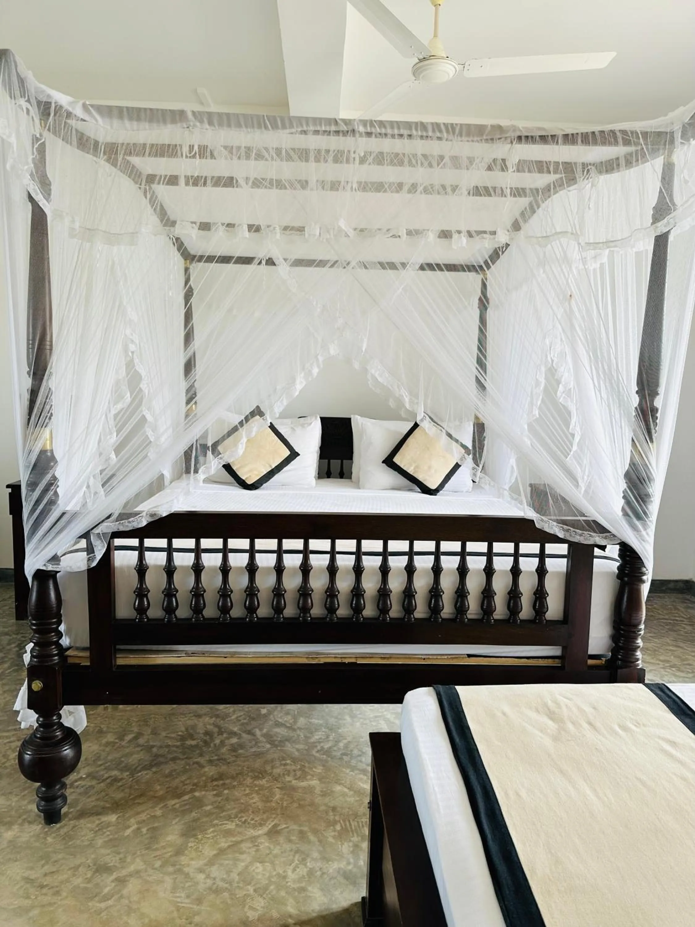 Bed in Mirissa Gate Resort