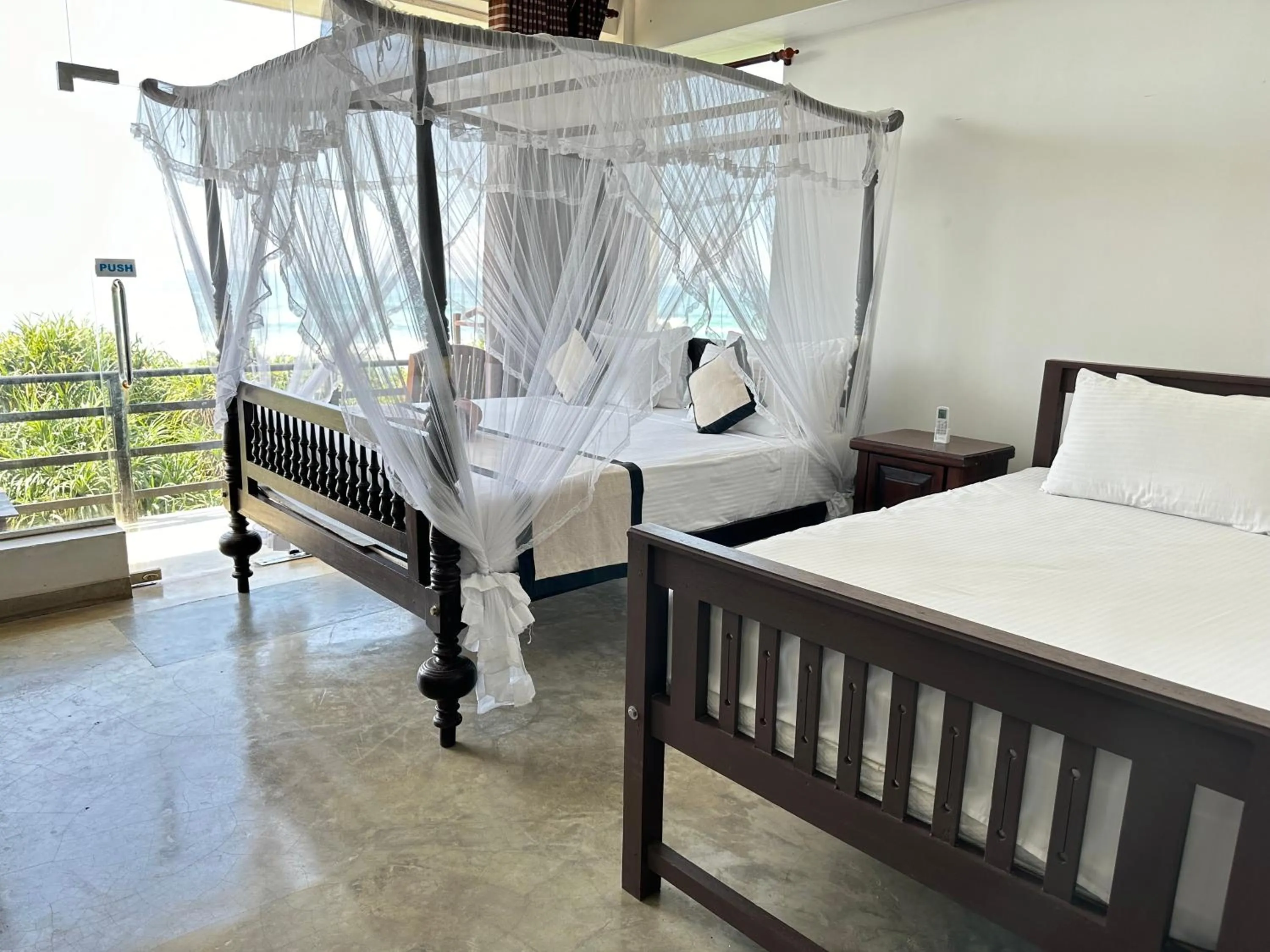 Bed in Mirissa Gate Resort