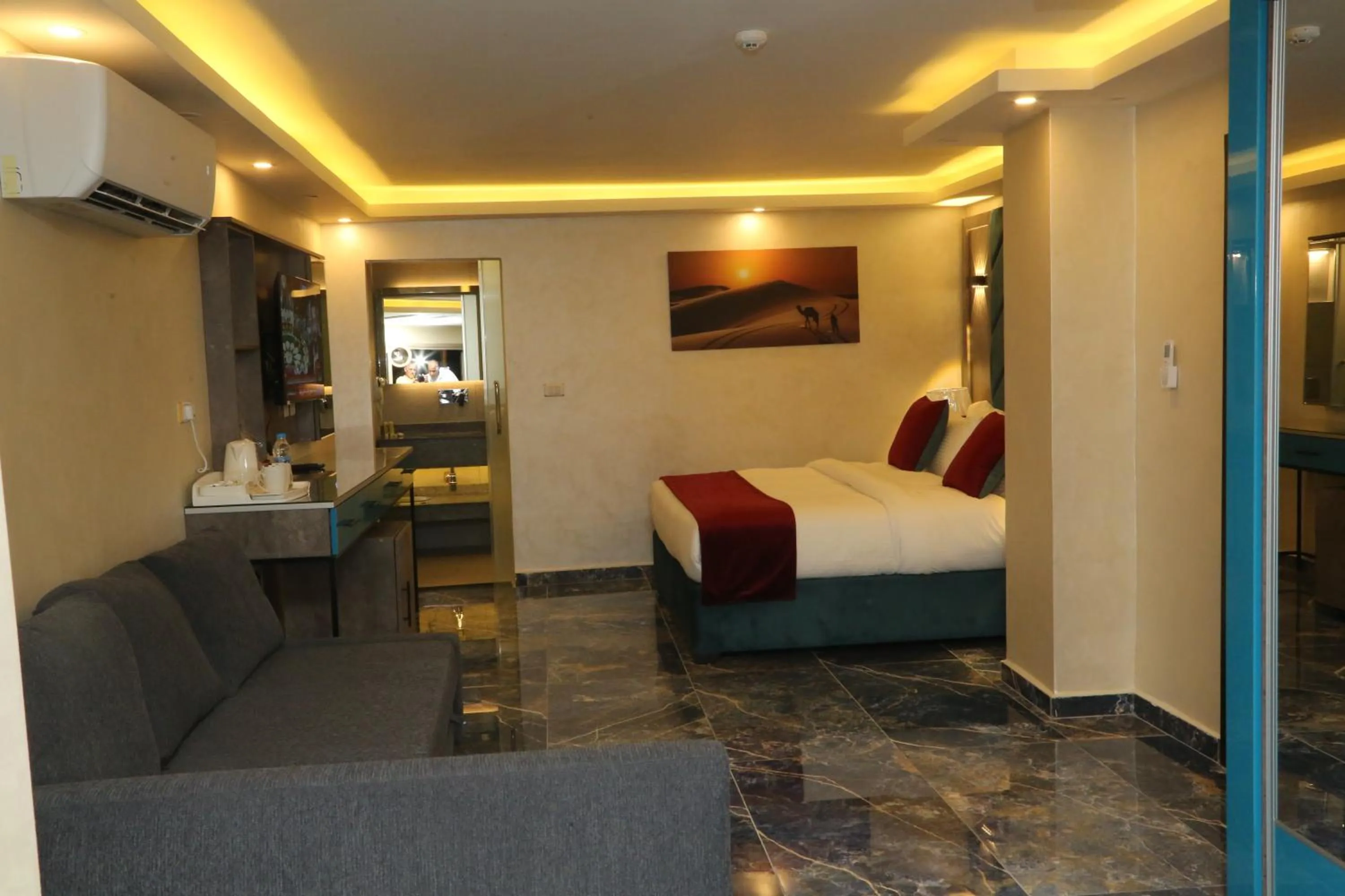 Seating area, Bed in Petra Sella Hotel