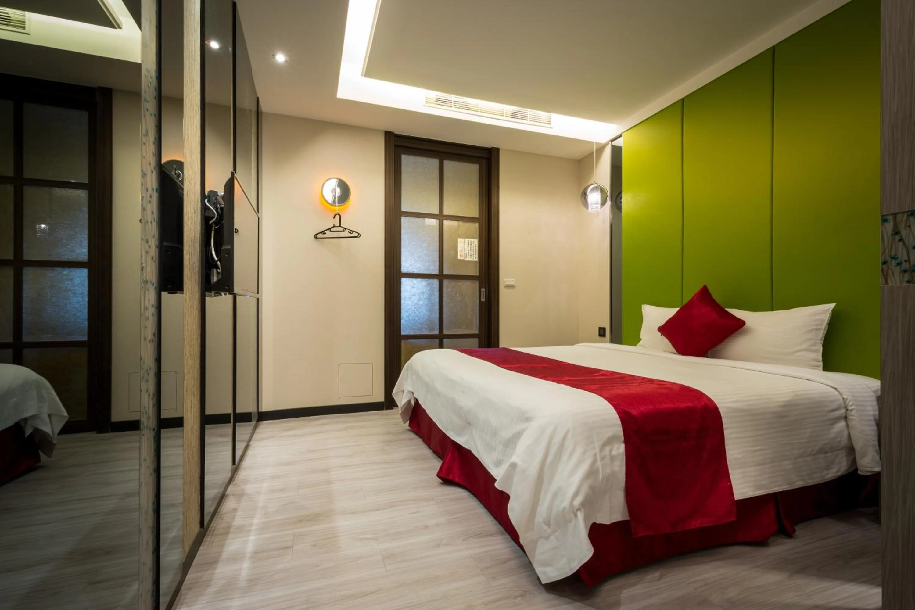 Bed in Jin Spa Resort Hotel