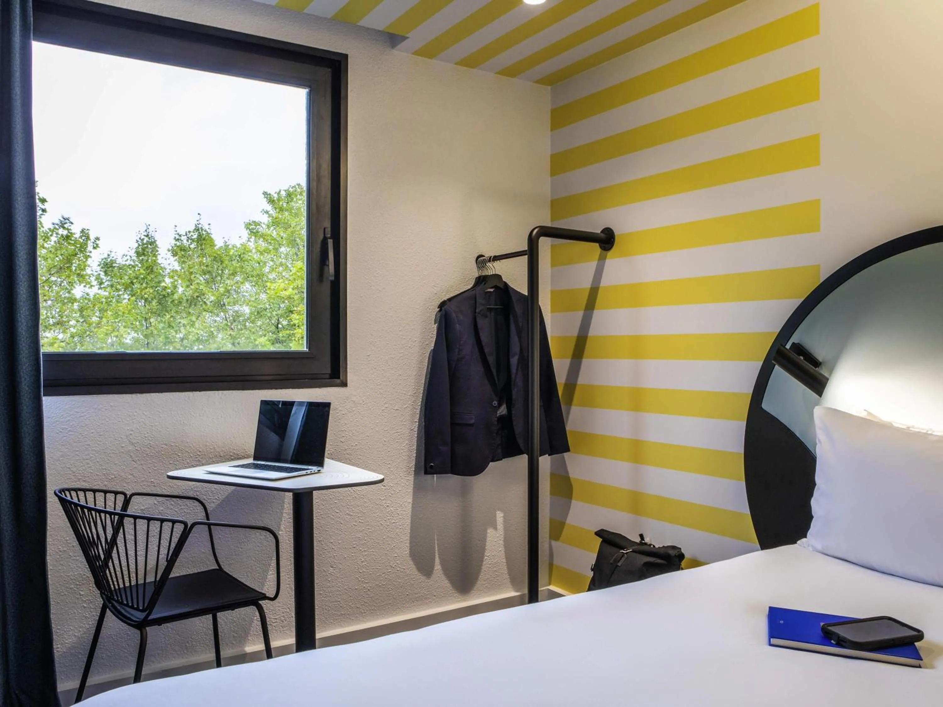 Bedroom in Ibis Styles Paris Saint Denis Pleyel