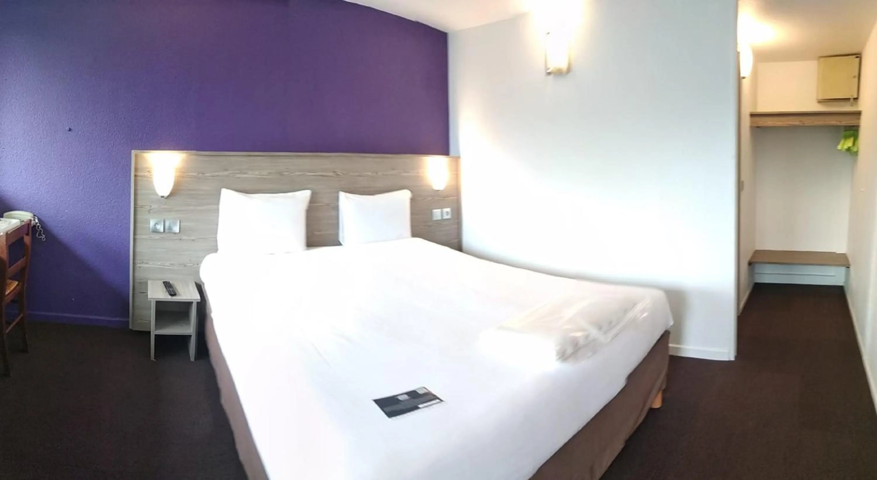 View (from property/room), Bed in Kyriad Chantilly Sud - Luzarches