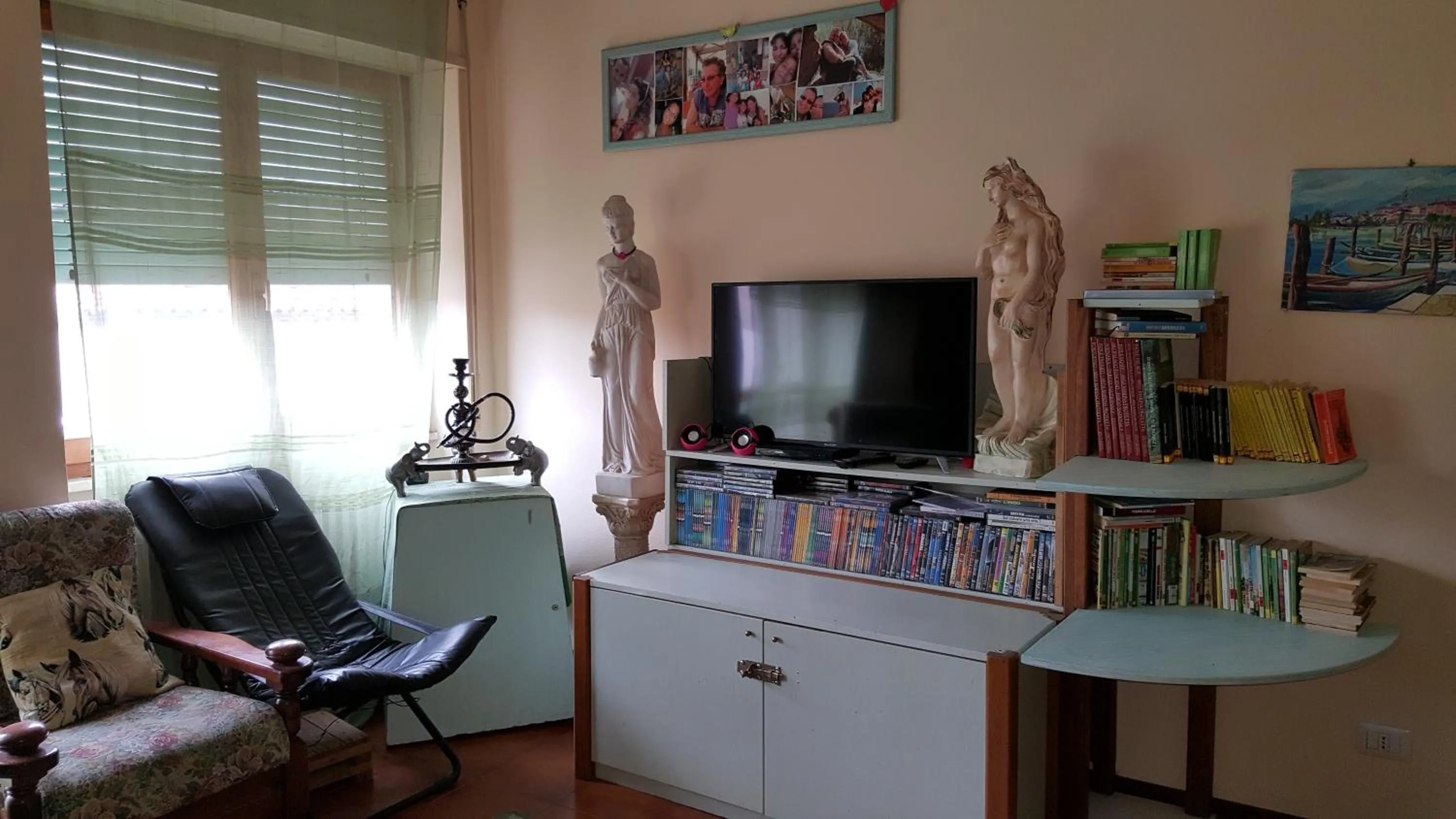 Communal lounge/ TV room in B&B Le Mille E Una Notte