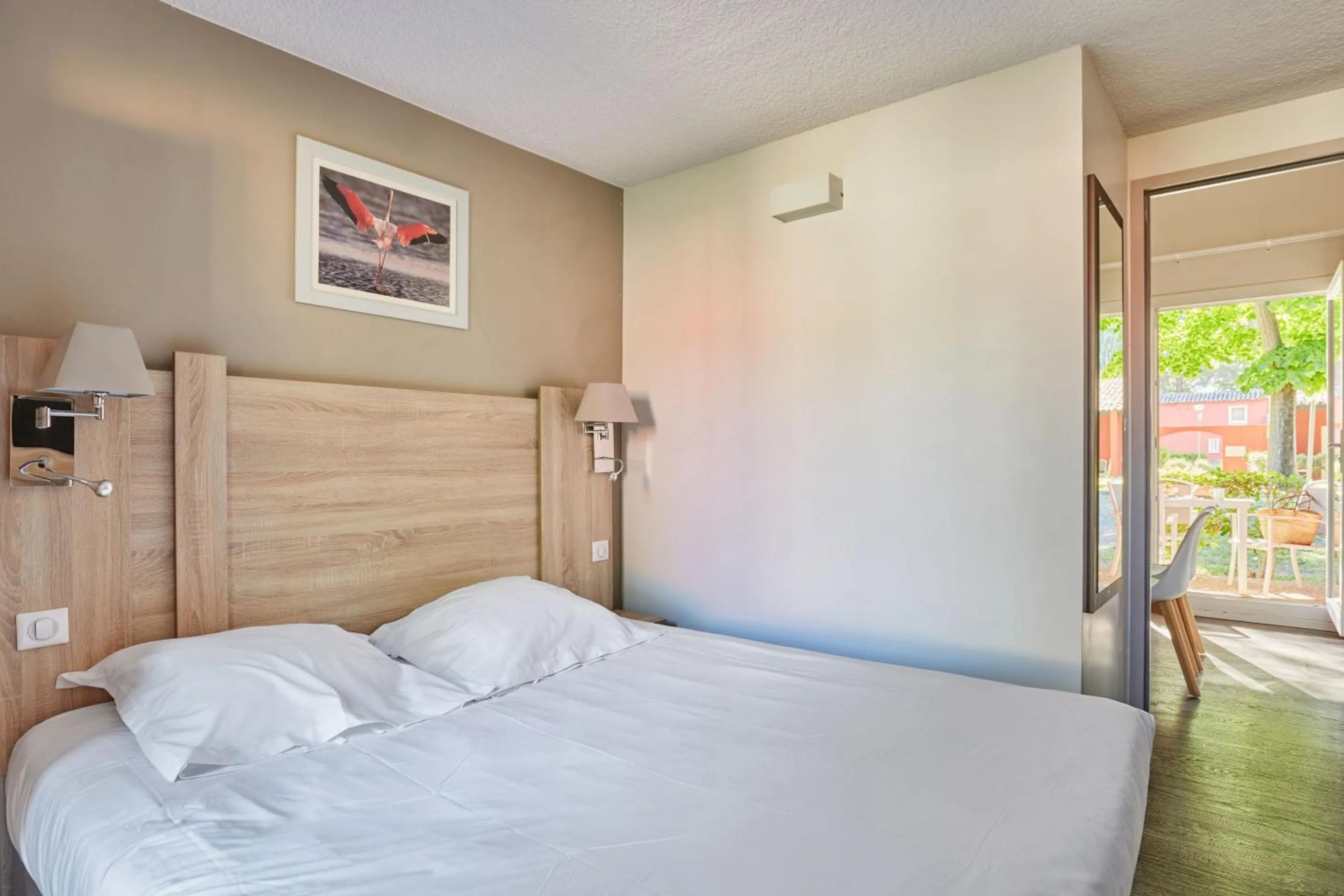 Bedroom, Bed in Résidence Odalys Le Village Camarguais Les Gardians