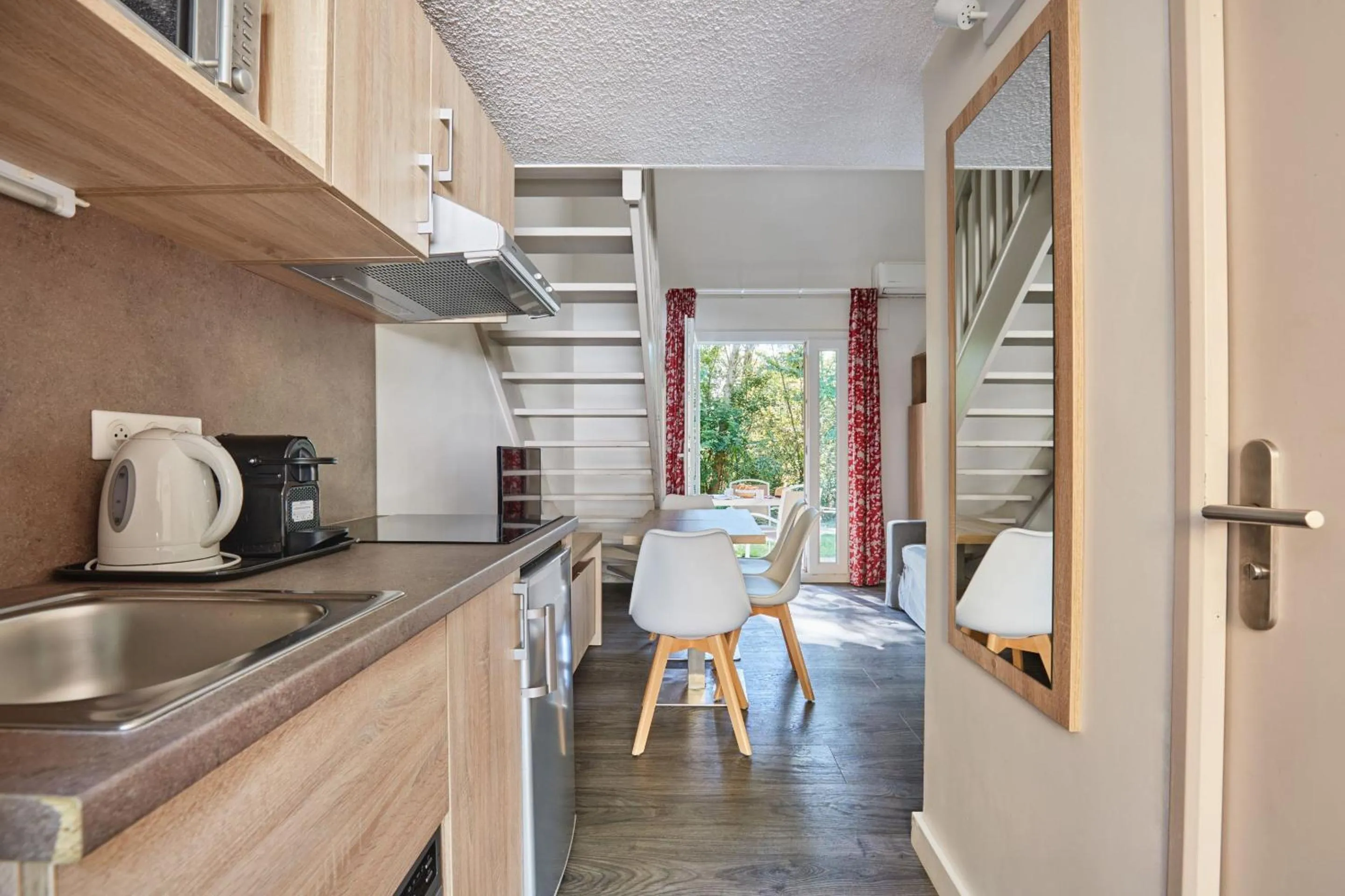 Kitchen or kitchenette in Résidence Odalys Le Village Camarguais Les Gardians