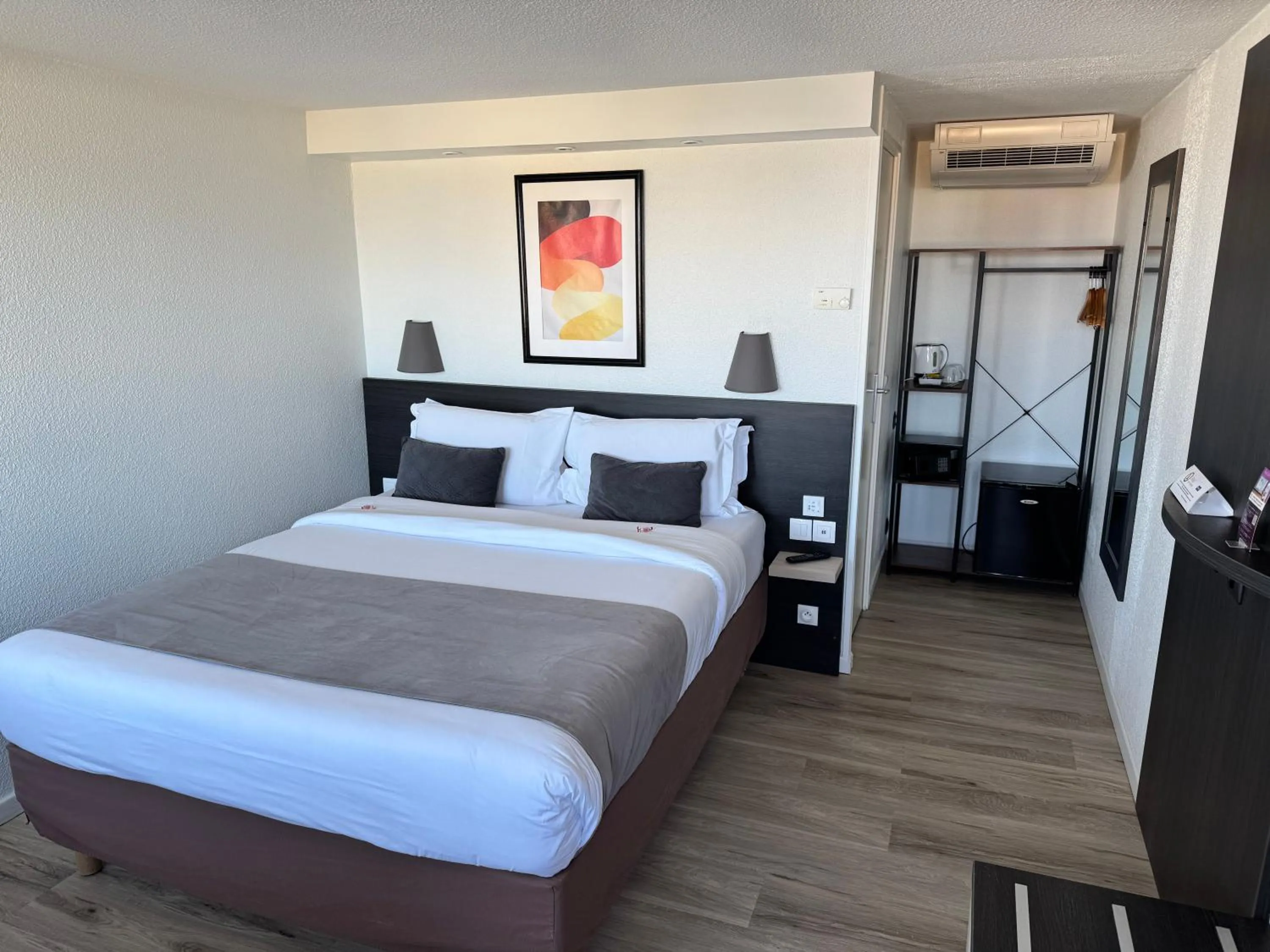 Photo of the whole room, Bed in Kyriad Lisieux