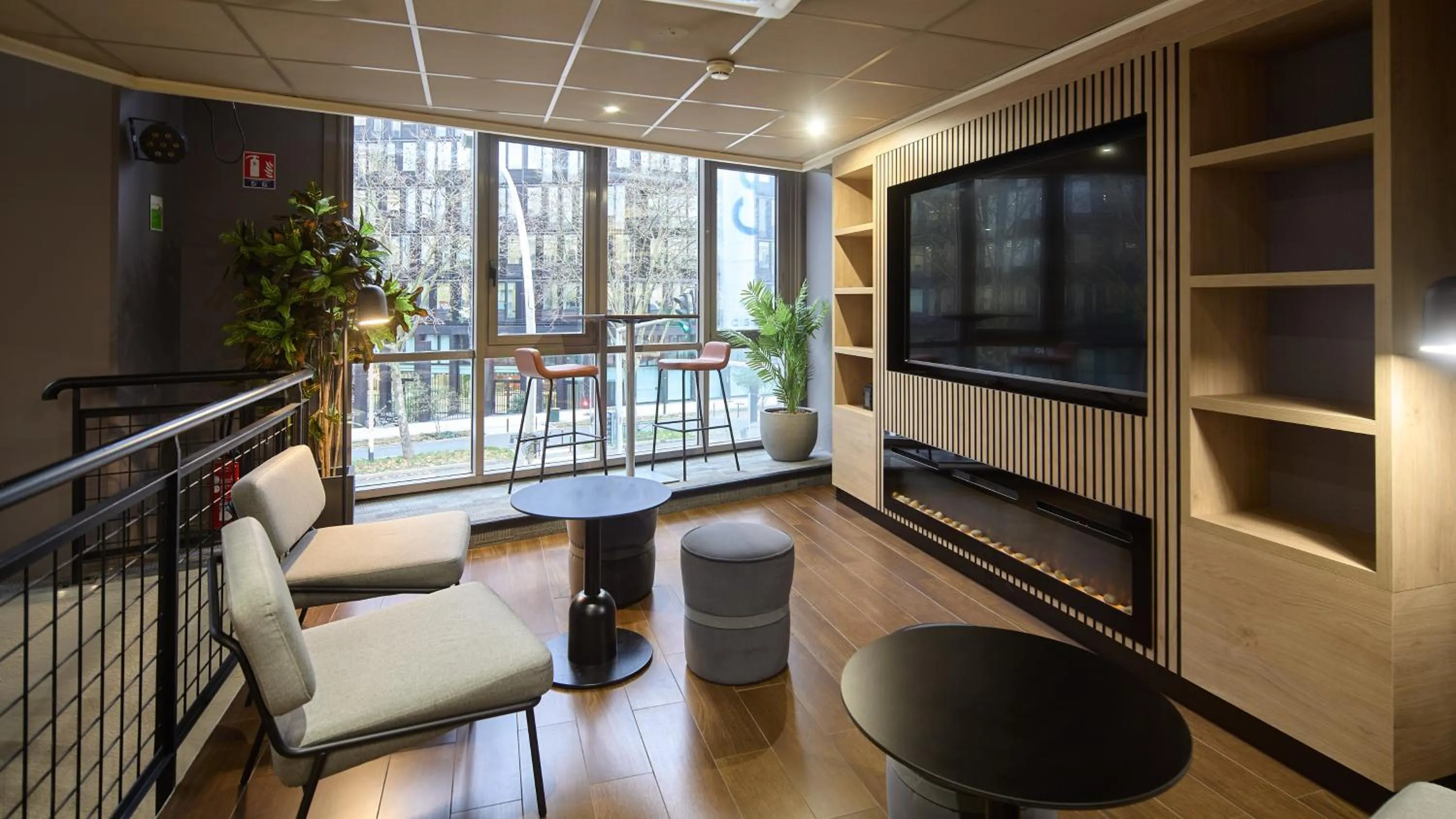 Communal lounge/ TV room in Campanile PRIME - Arcueil