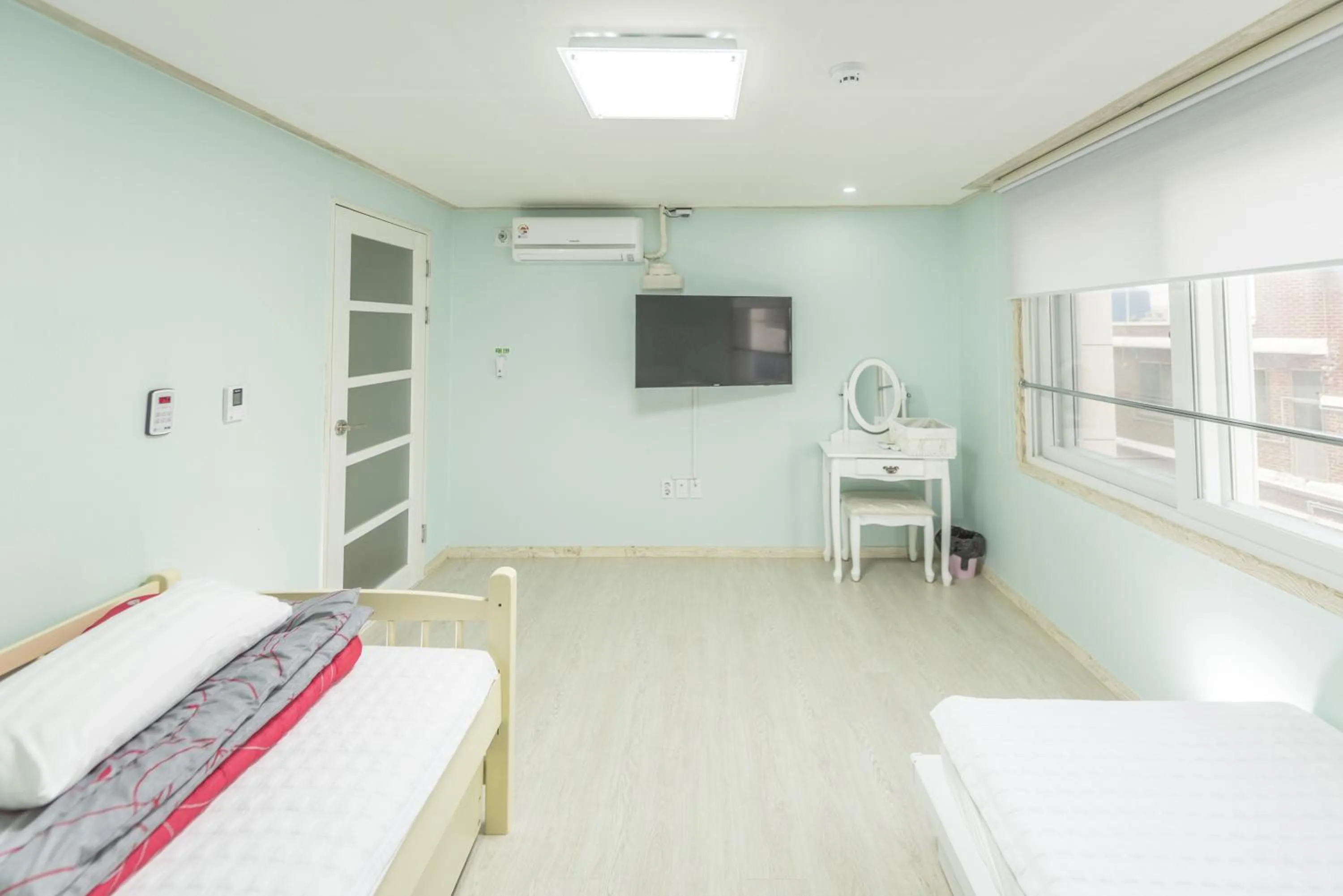 Bed, TV/Entertainment Center in Big O Show Guesthouse