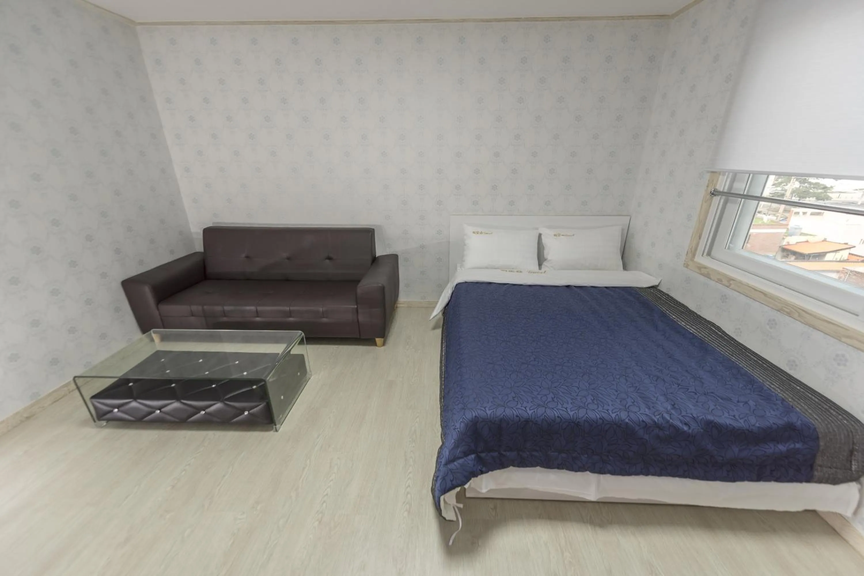 Bed in Big O Show Guesthouse