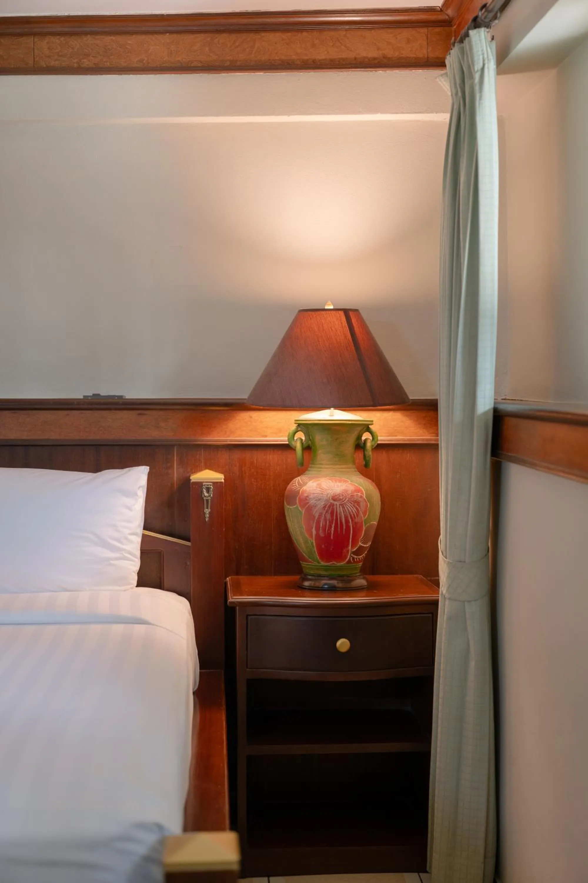 Text overlay, Bed in Erawan Phangnga Hotel, Natai Beach