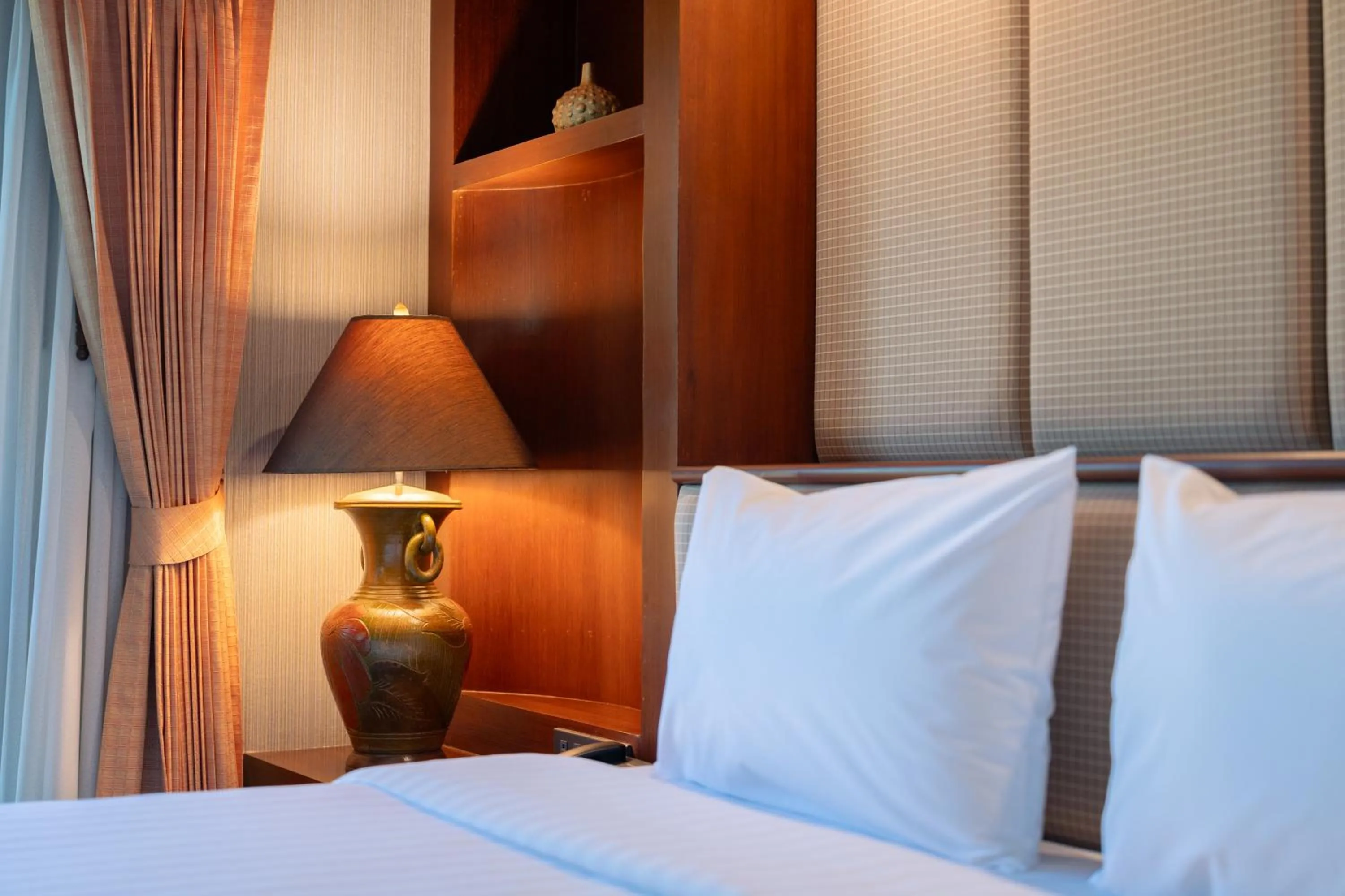 Text overlay, Bed in Erawan Phangnga Hotel, Natai Beach