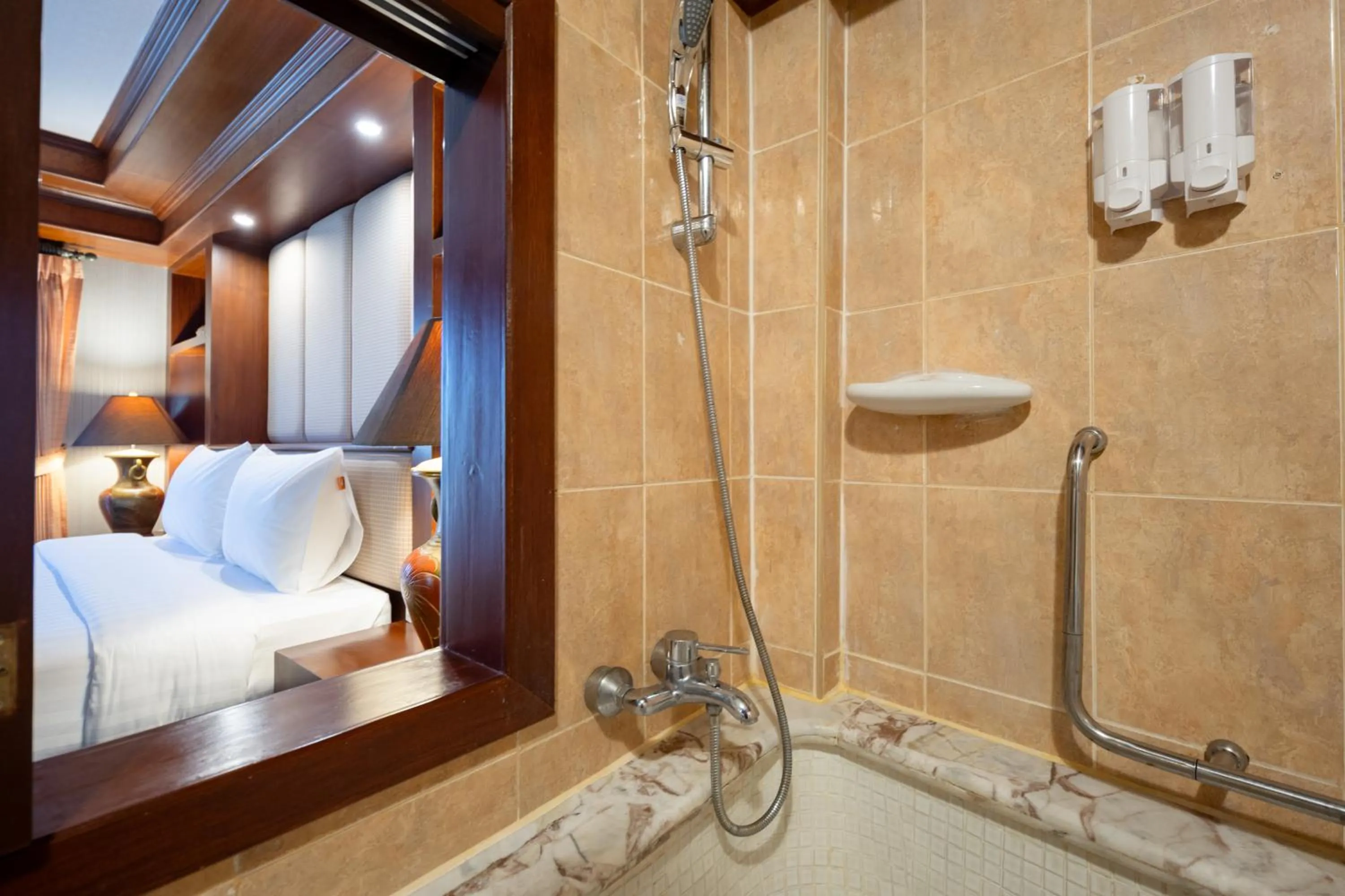 Text overlay, Bed in Erawan Phangnga Hotel, Natai Beach