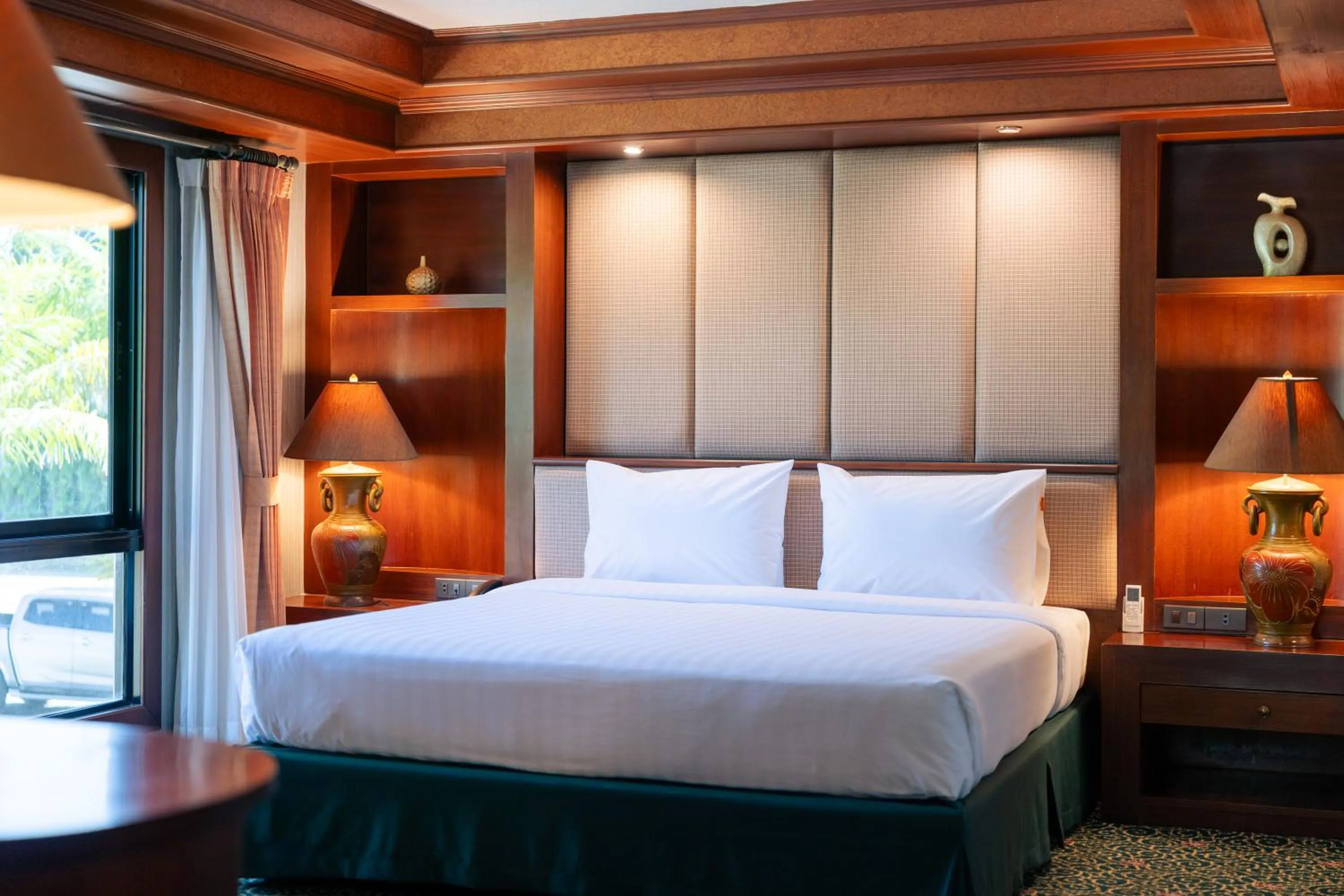 Bed in Erawan Phangnga Hotel, Natai Beach