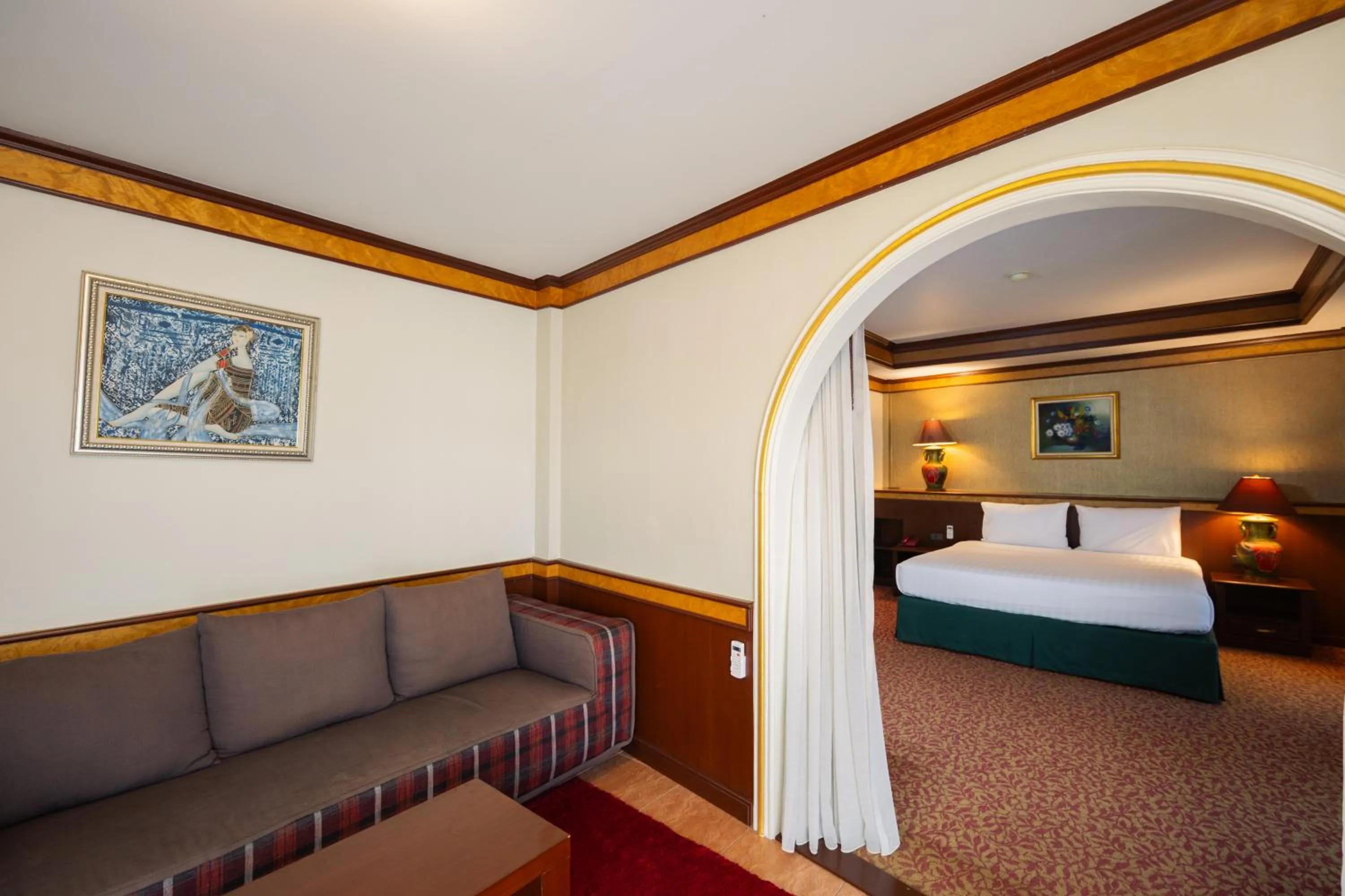 Living room, Bed in Erawan Phangnga Hotel, Natai Beach