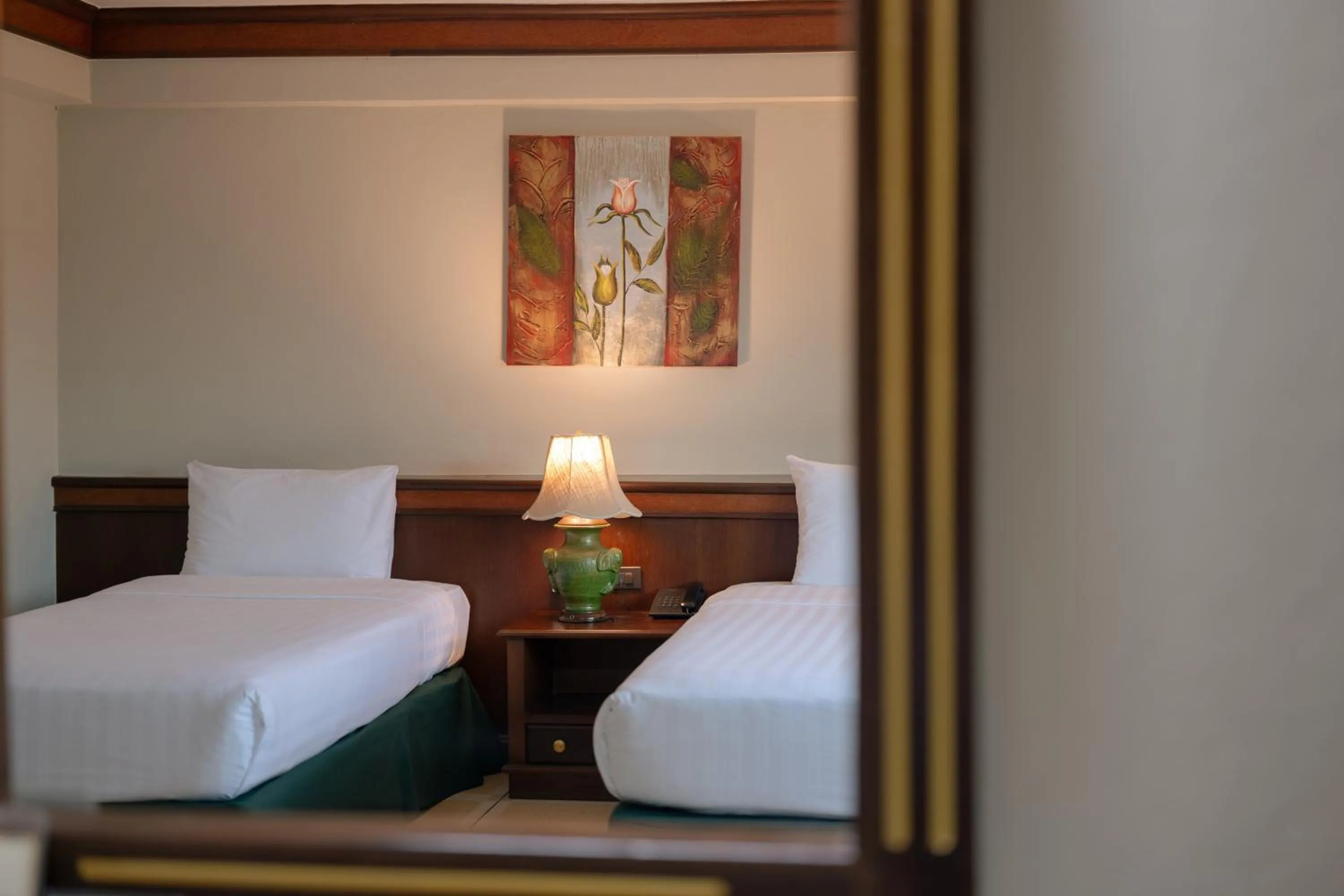 Bed in Erawan Hotel,Natai Beach