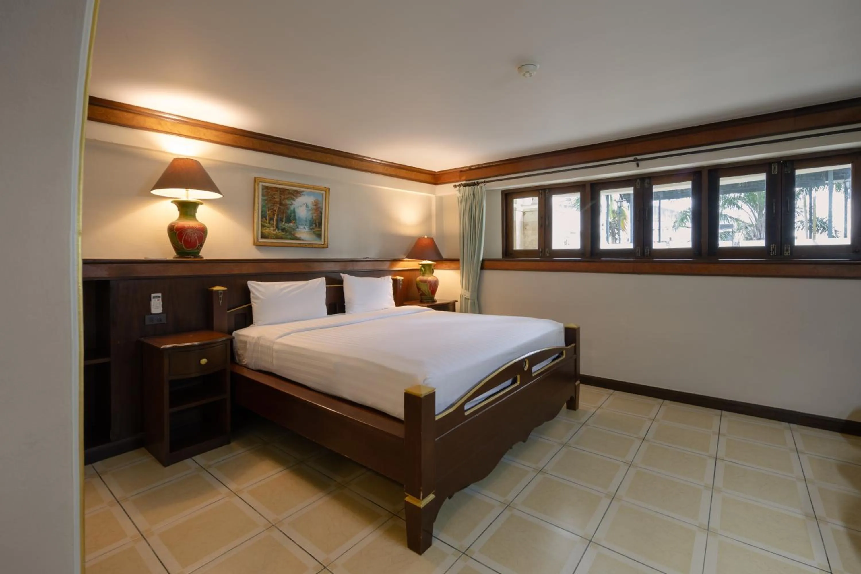 Bed in Erawan Phangnga Hotel, Natai Beach