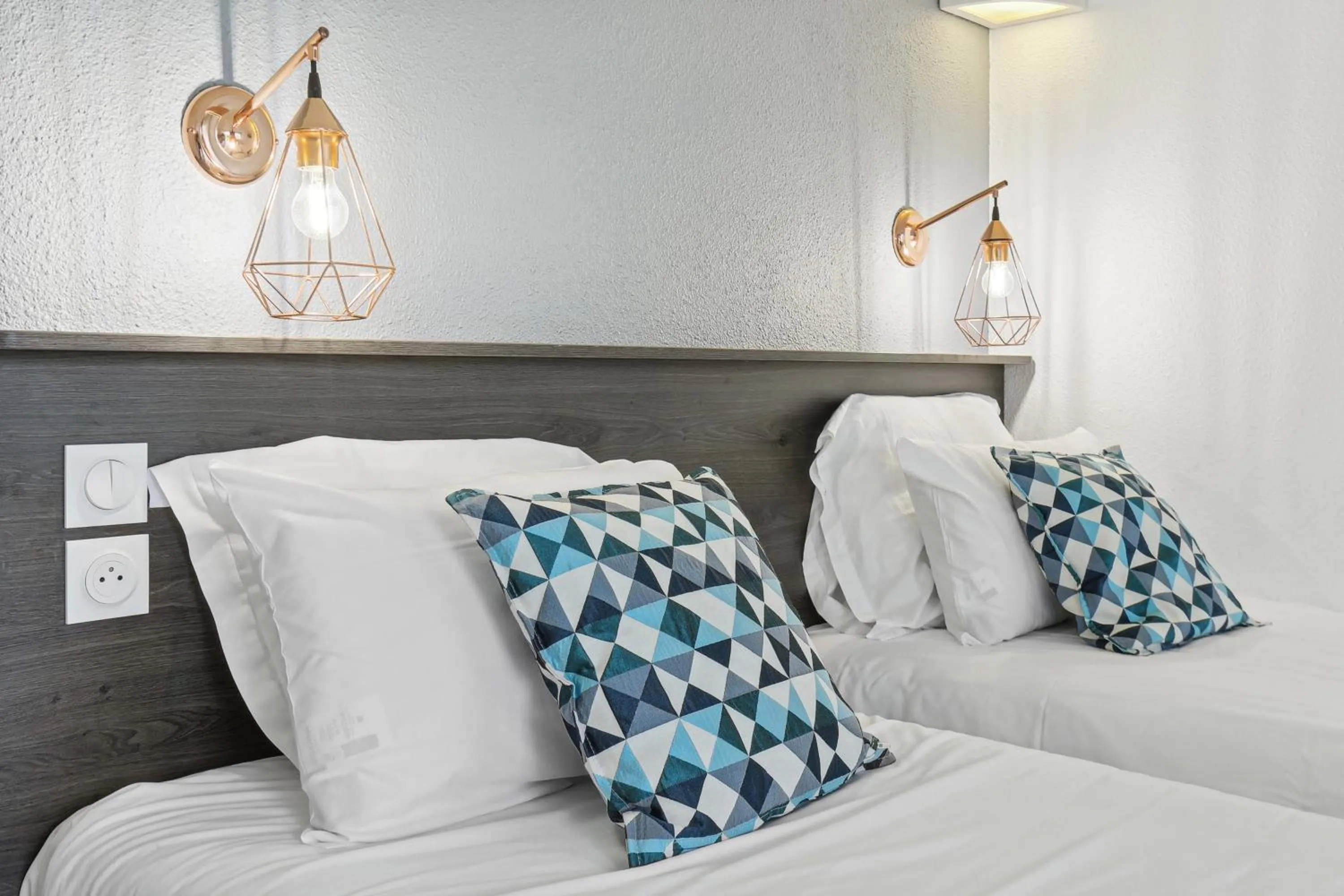 Bedroom, Bed in Le 2 By Hotel Akena - La Ferté Bernard