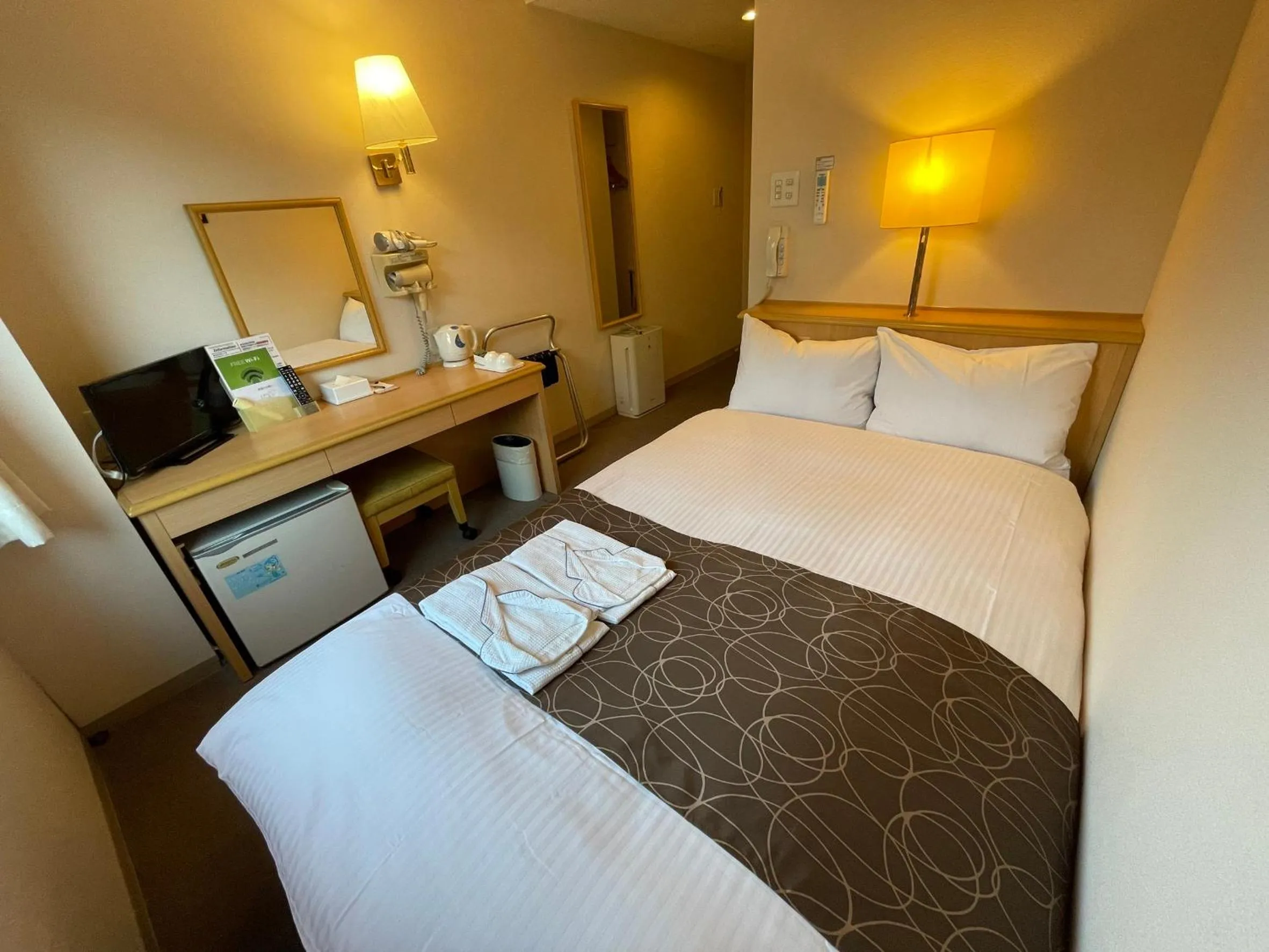 Bed in Saga Idaimae Green Hotel