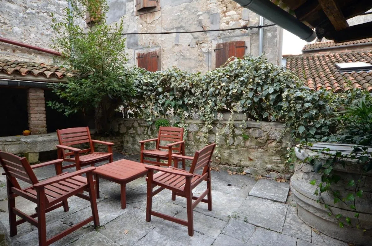Balcony/Terrace in Apartment Il Cortile with garden and parking