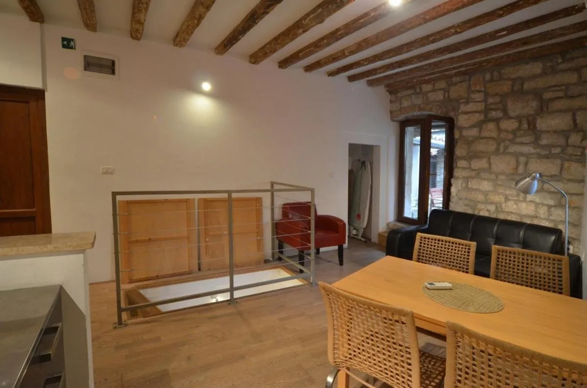Seating area in Apartment Il Cortile with garden and parking
