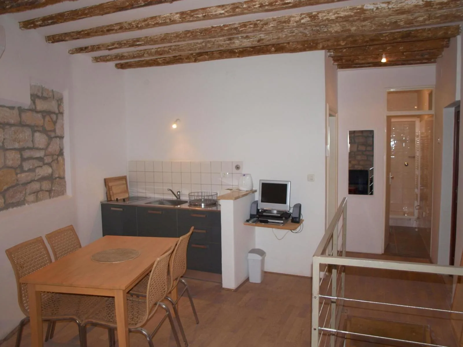 Kitchen or kitchenette in Apartment Il Cortile with garden and parking