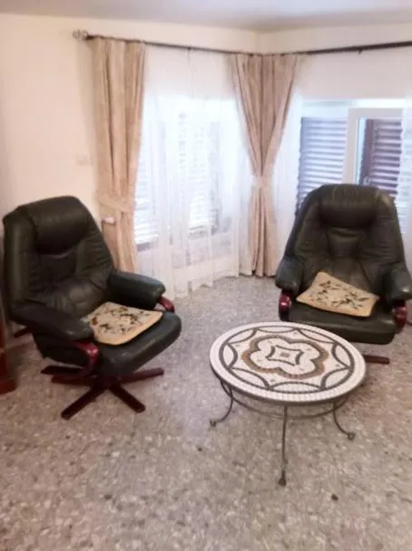 Seating area in Villa 2 Fields