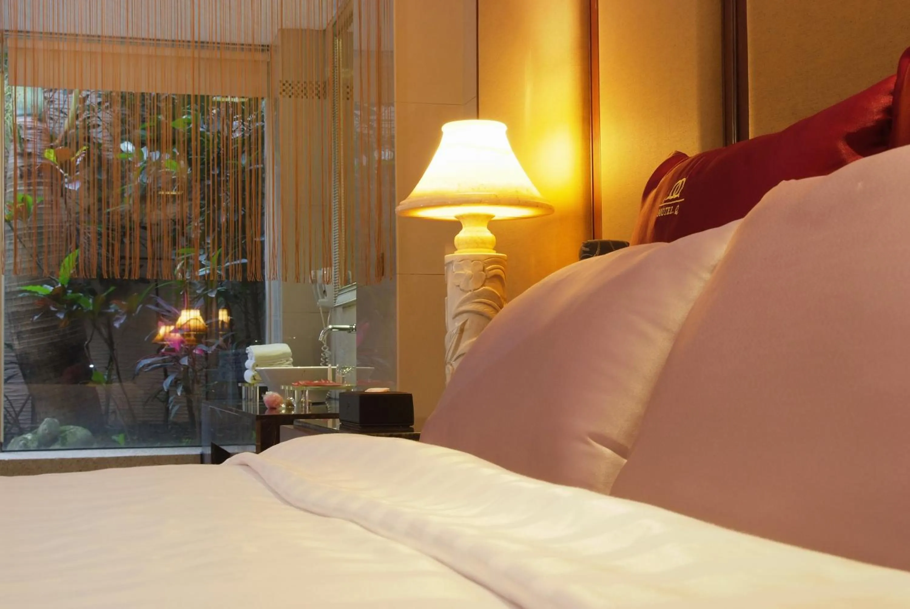 Bed in Q Motel精品旅館