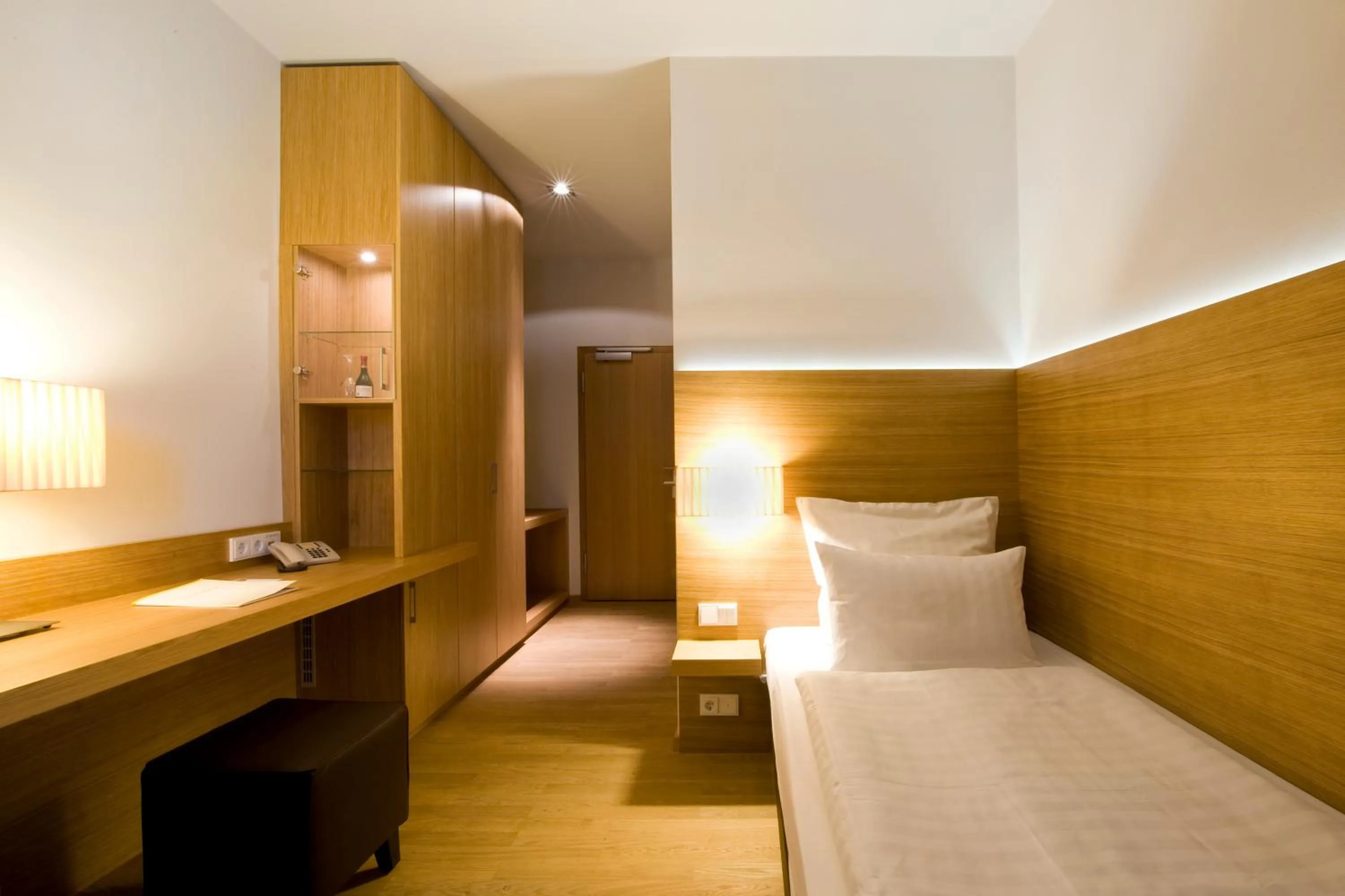 Seating area, Bed in Hotel Thalmair