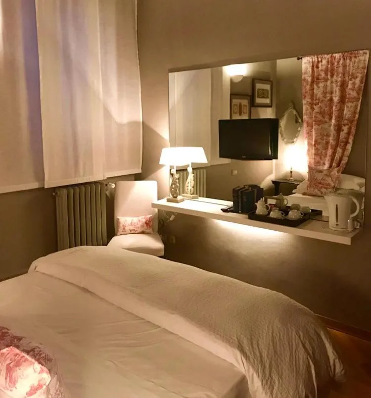 Bed in Capri Moon Guest House