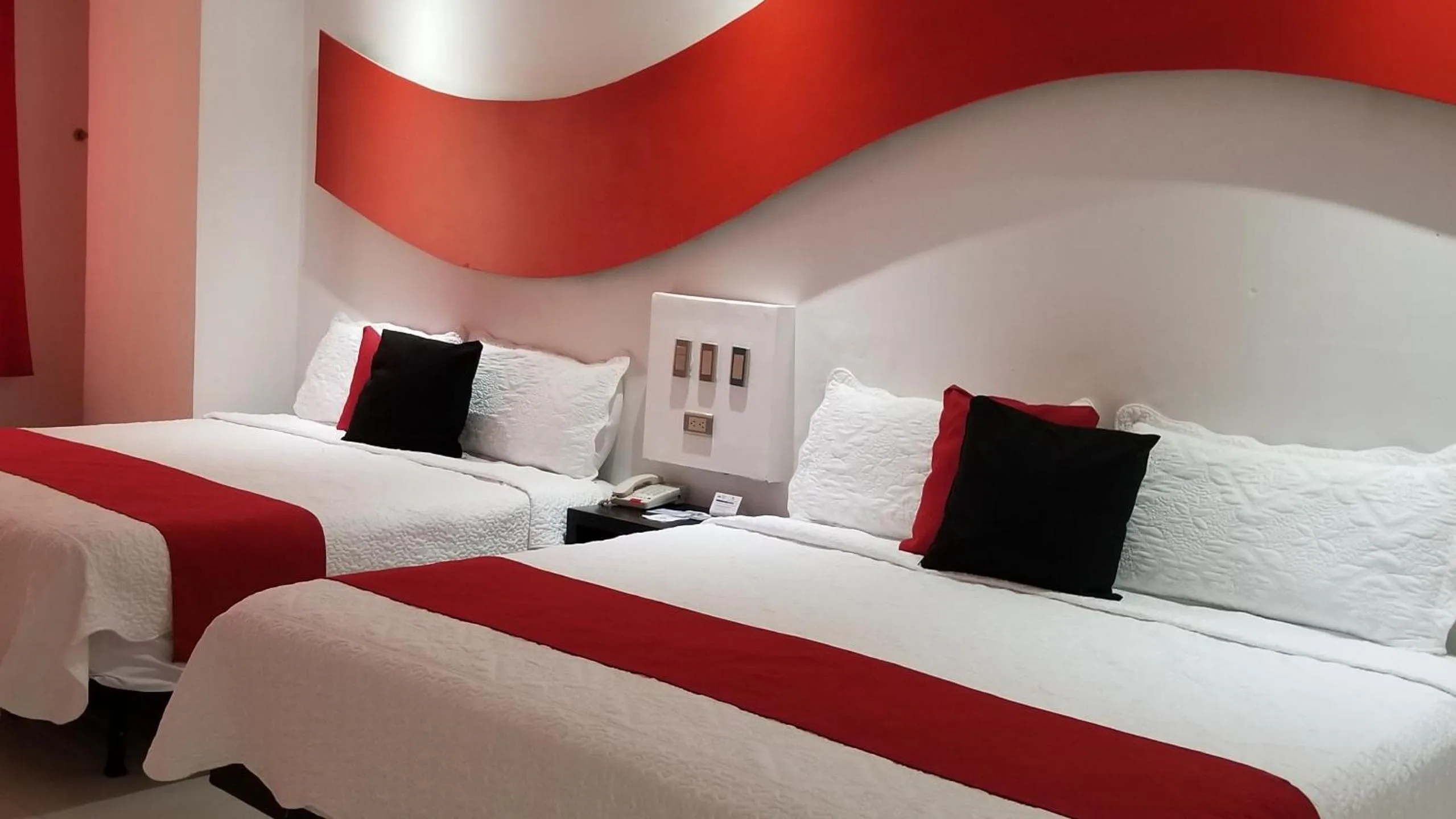 Bedroom in Hotel Dluxe