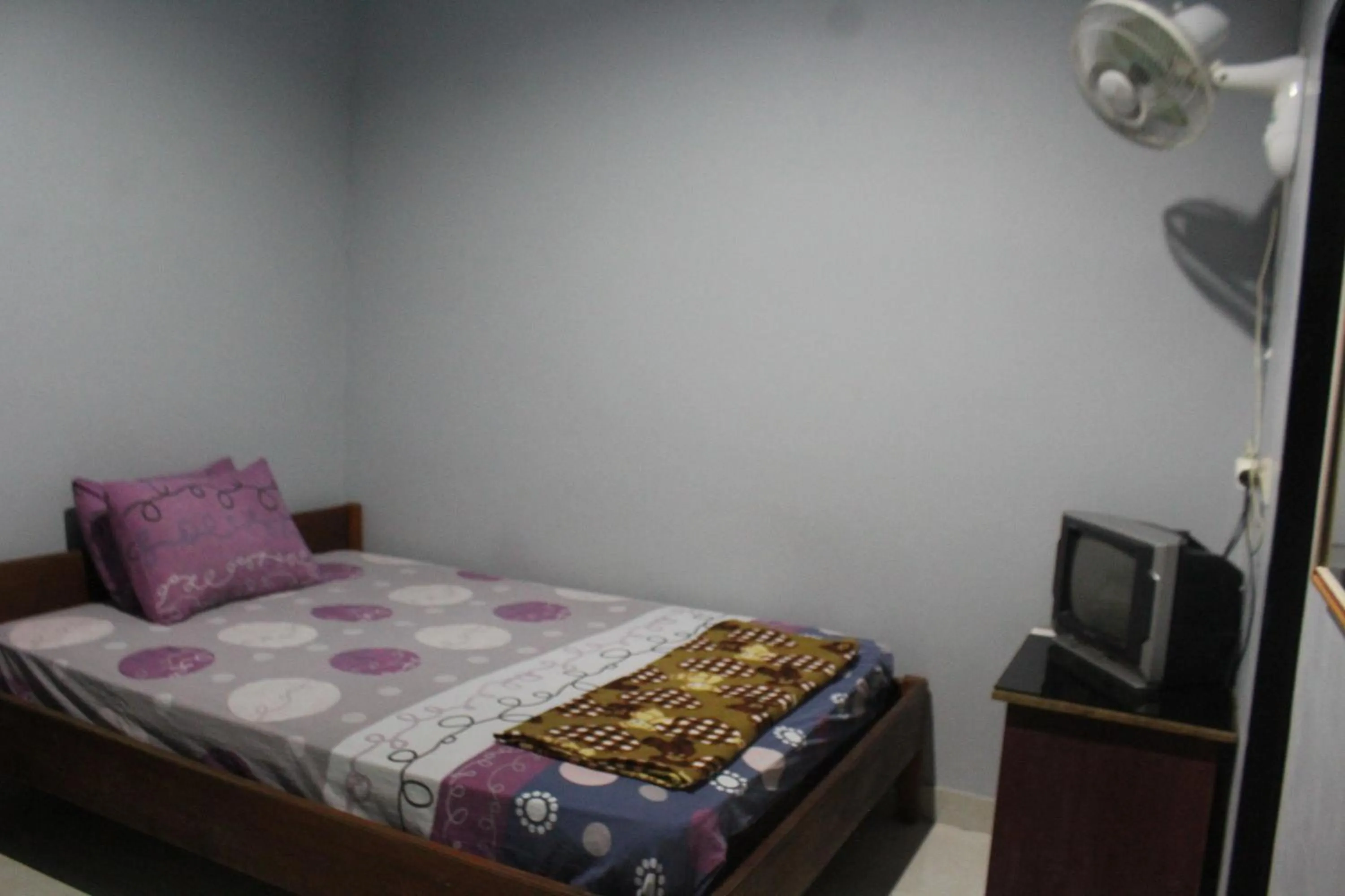 Bed in Penginapan Artha