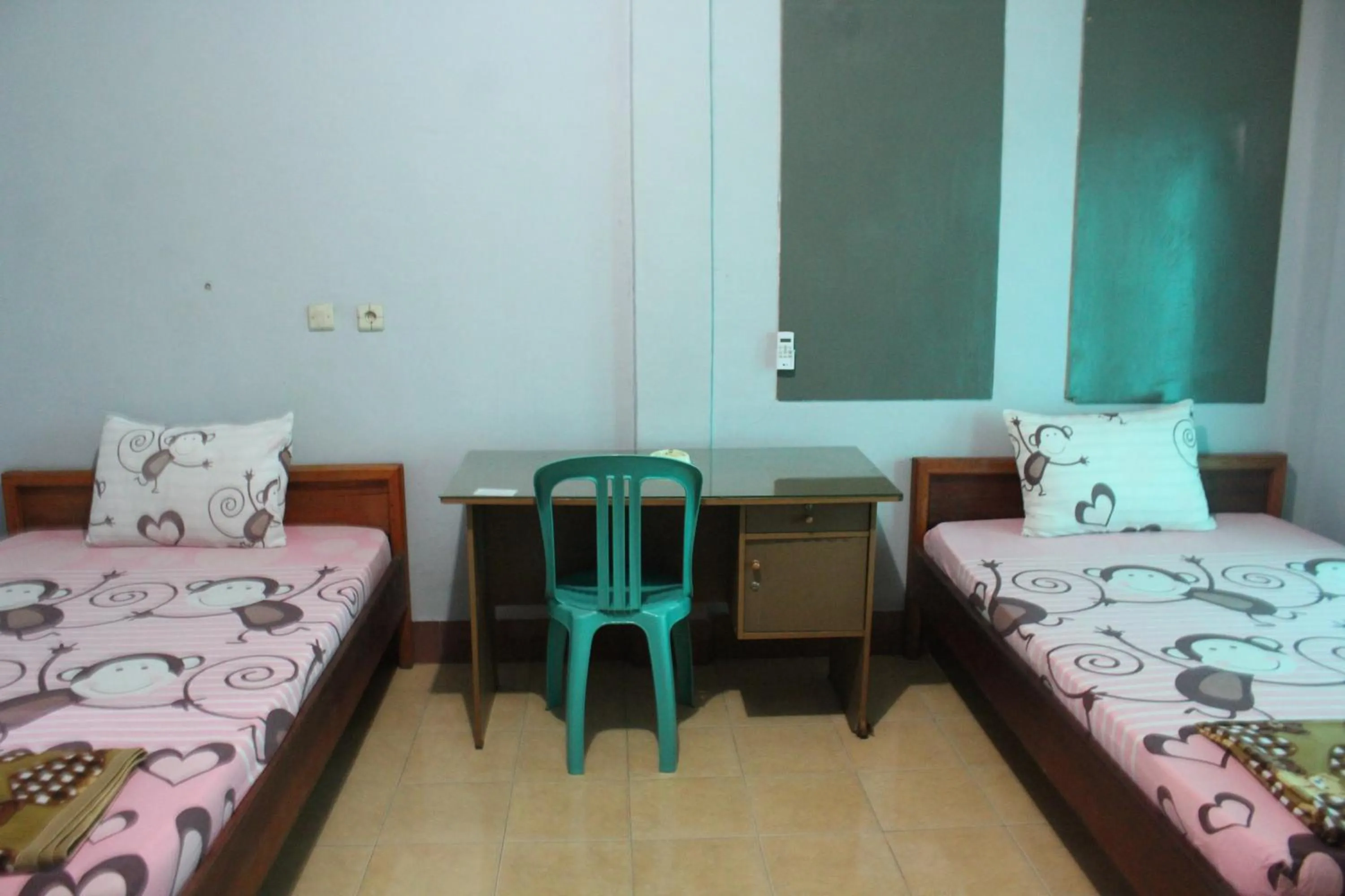 Photo of the whole room, Bed in Penginapan Artha