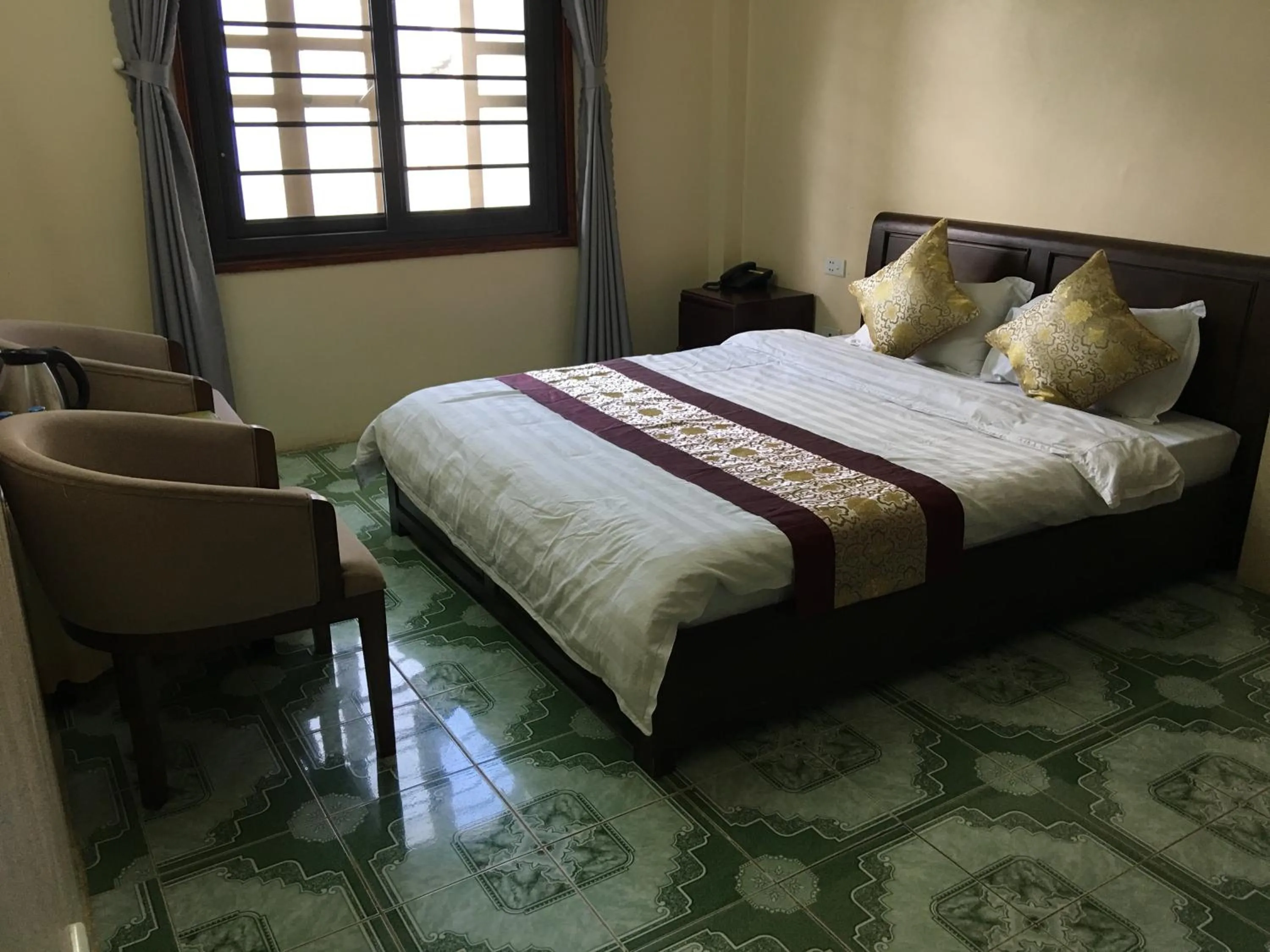 Bed in Hoang Ngoc Hotel