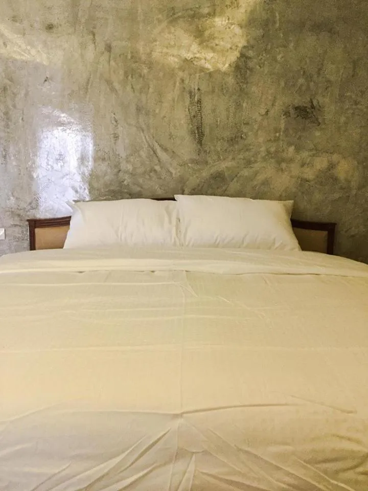Bed in Nai Suan Inn