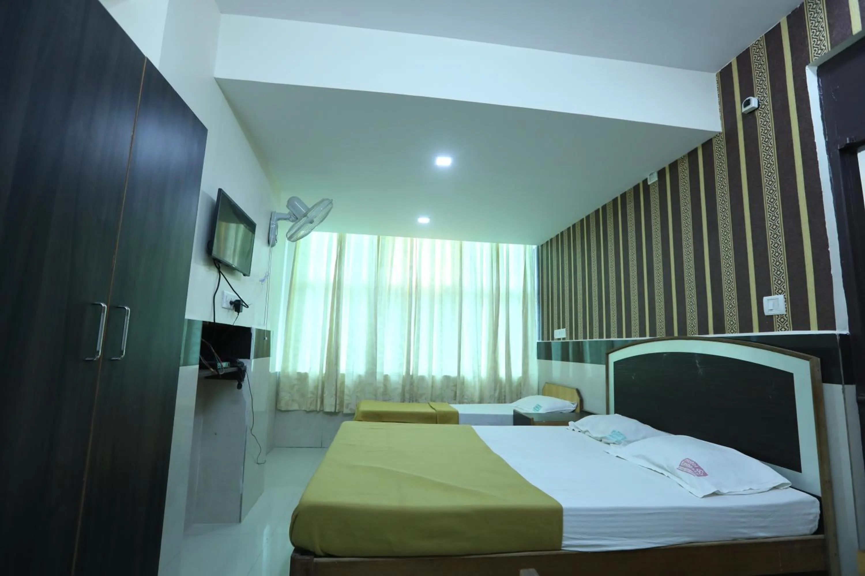 Bed in Hotel Embassy