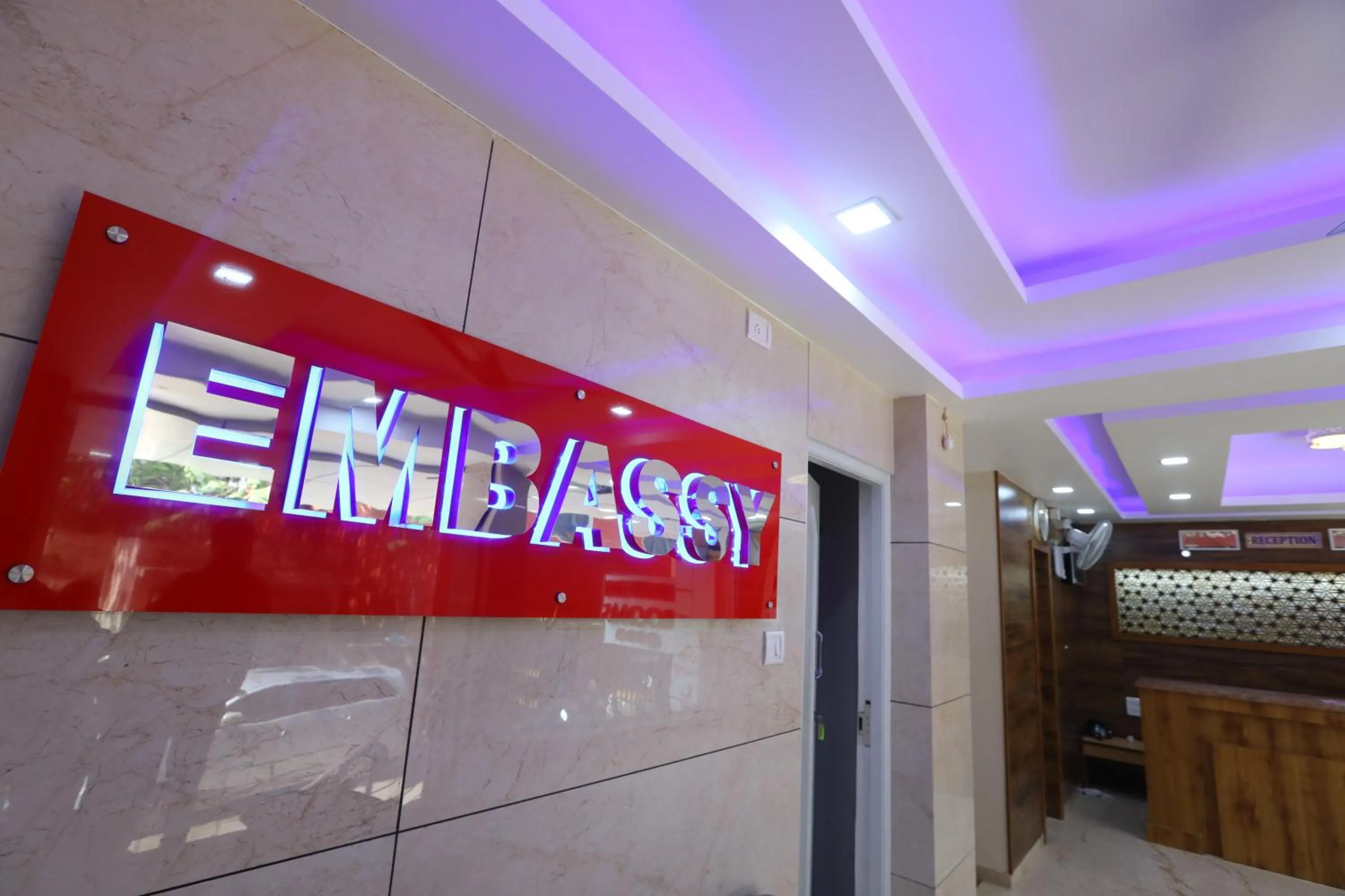 Property logo or sign in Hotel Embassy