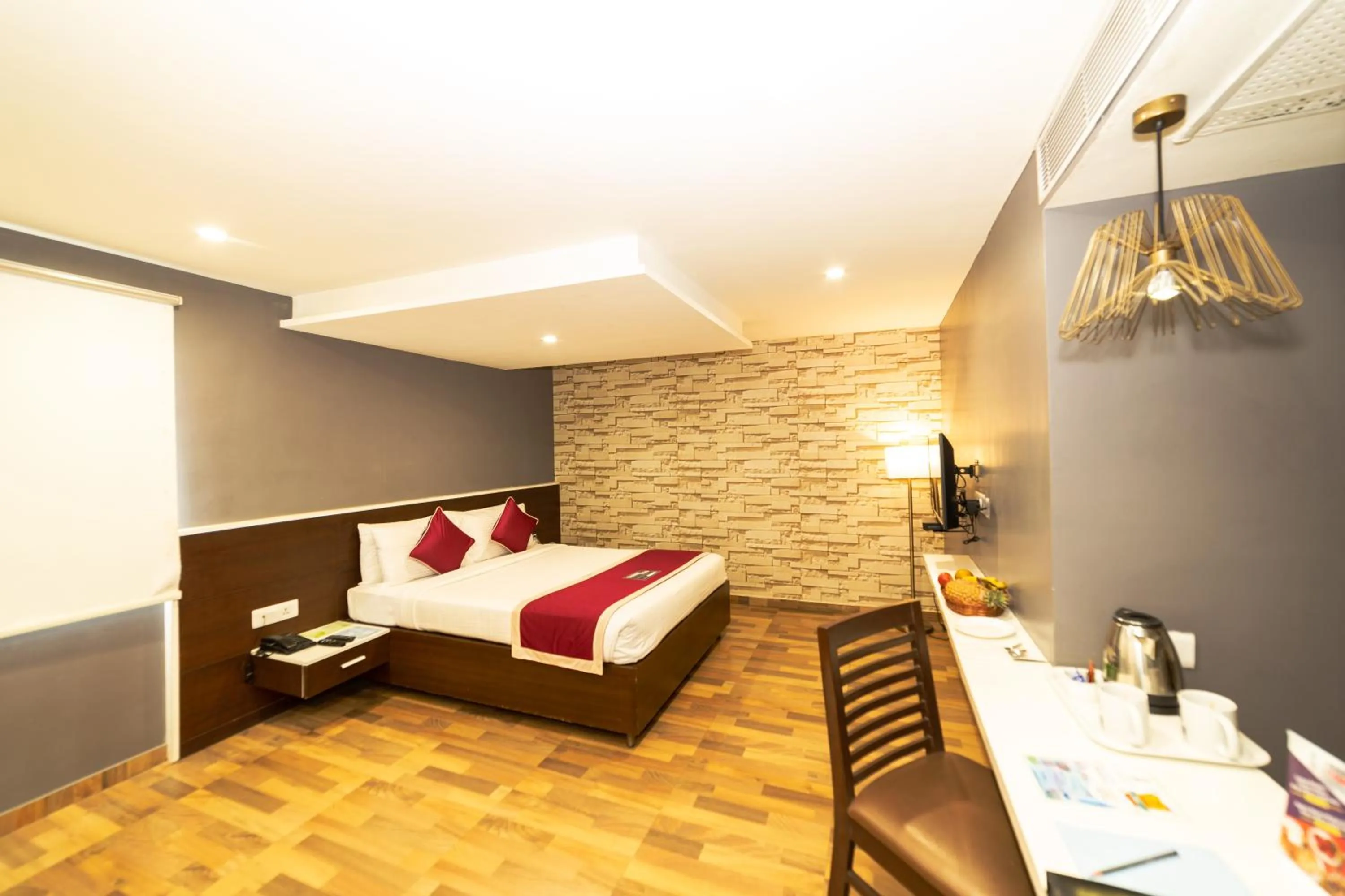 Bed in Icon Business Hotel by Bhagini