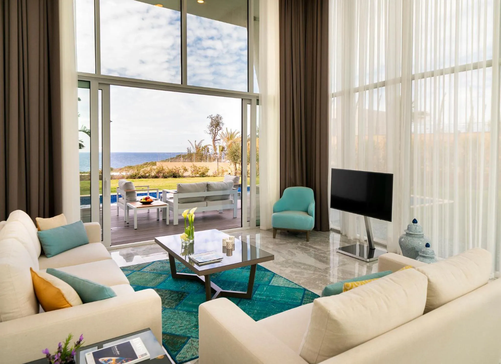 Communal lounge/ TV room in Le Meridien Bodrum Beach Resort