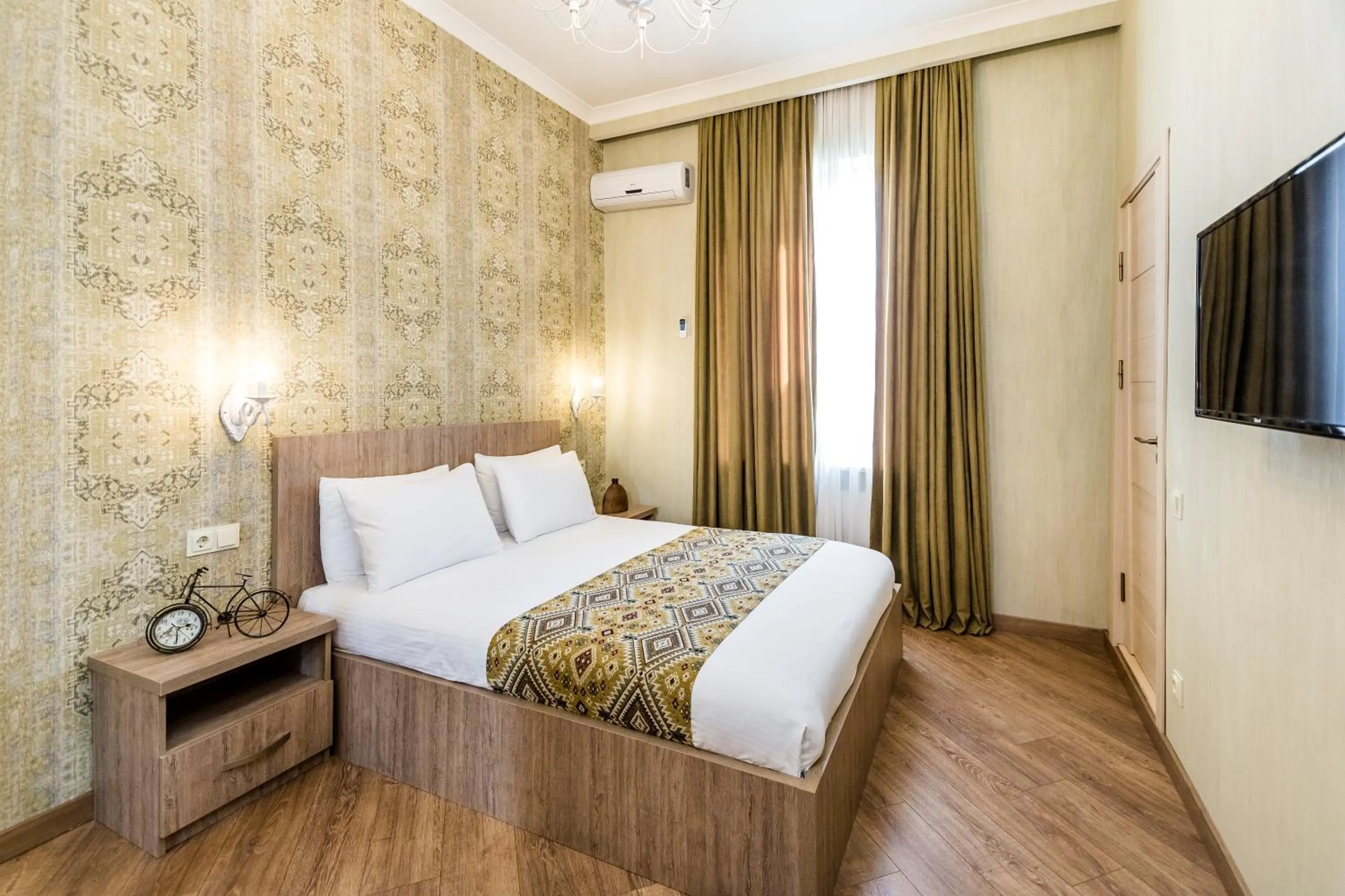 Decorative detail, Bed in Dat Exx Apartments on Marjanishvili