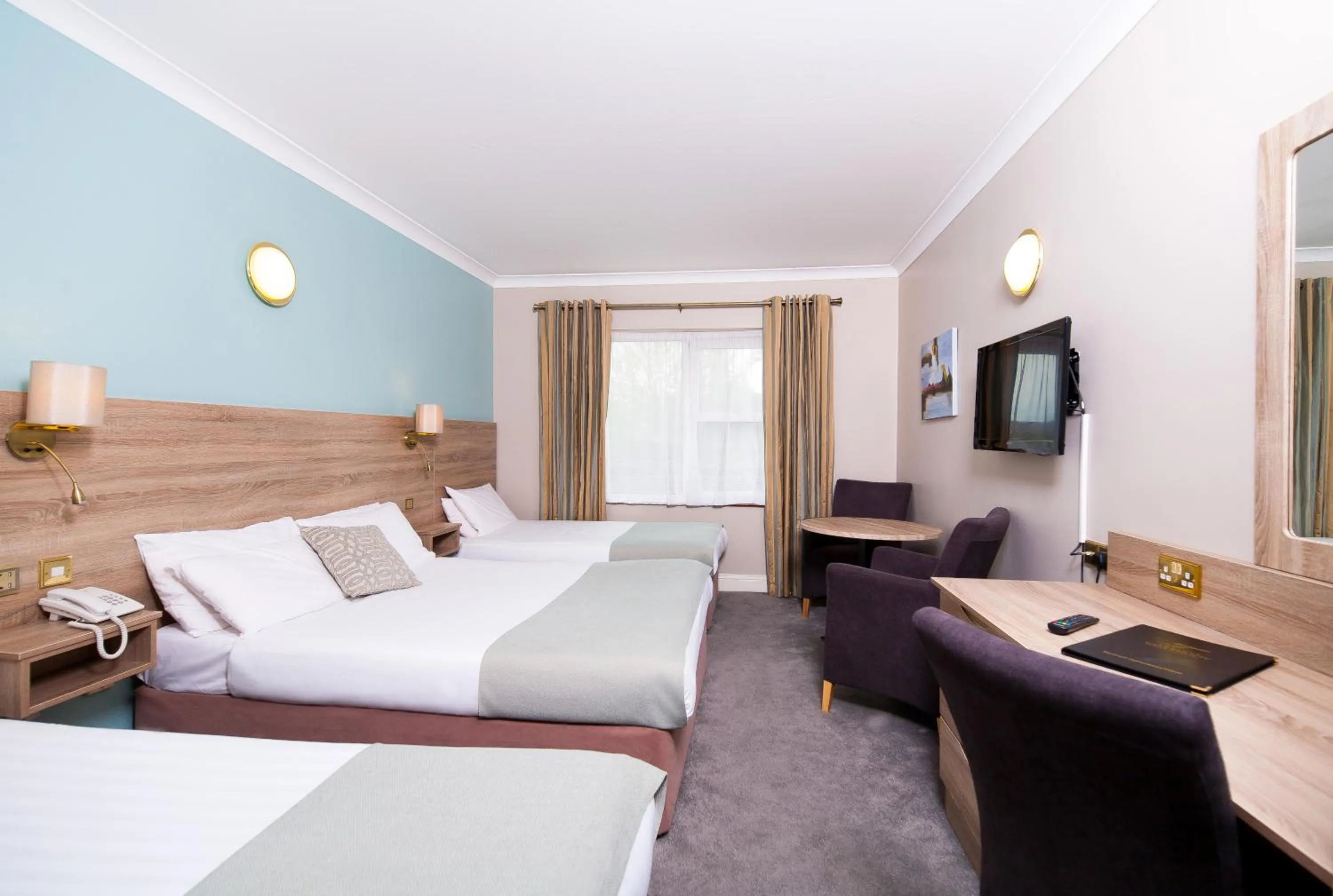 Photo of the whole room, Bed in Treacys West County Conference and Leisure Centre