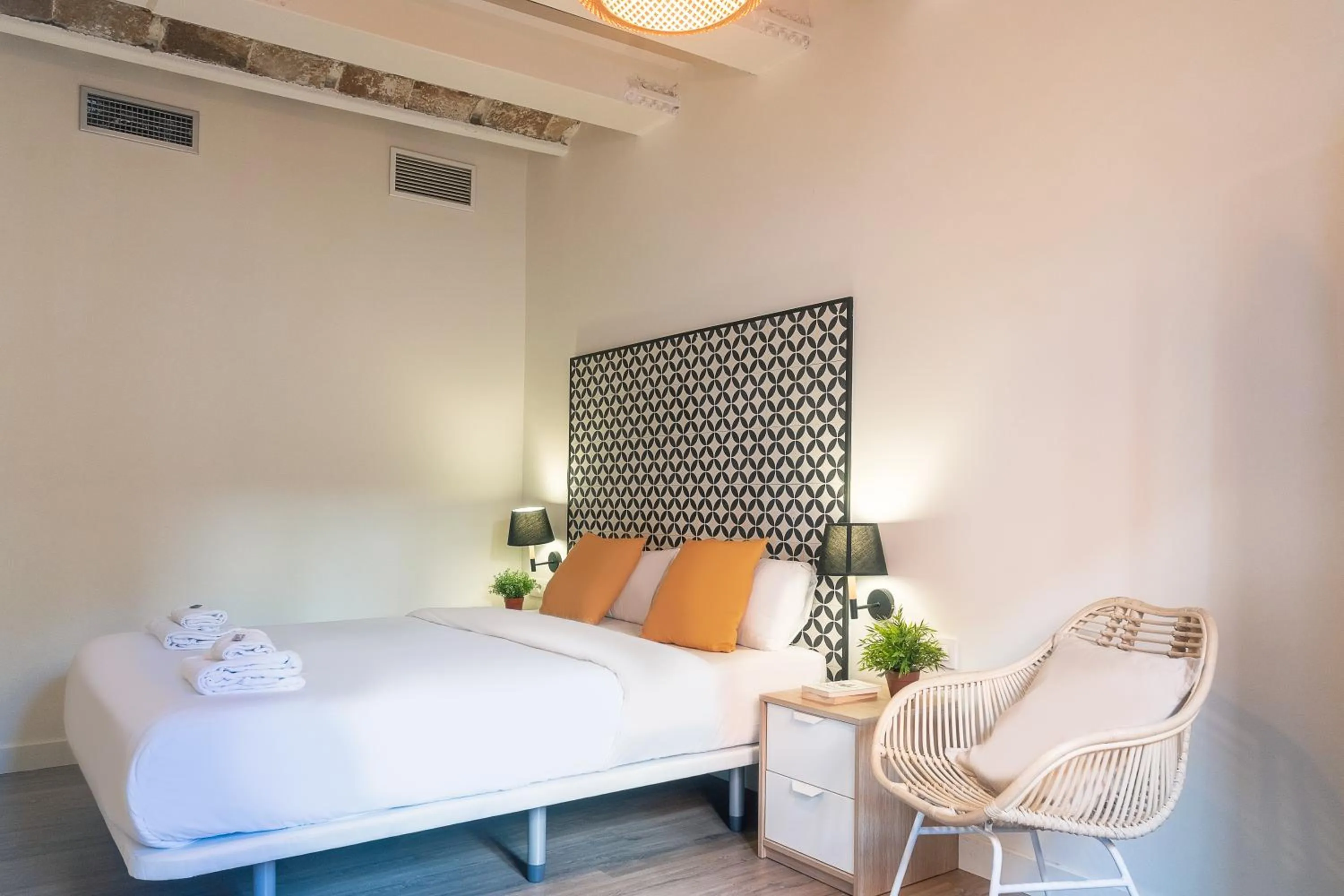 Bed in Modern Catalan Apartments by Olala Homes