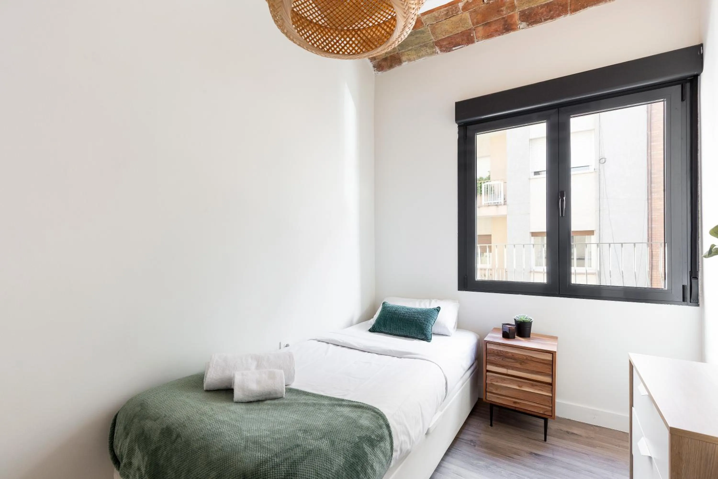 Bed in Modern Catalan Apartments by Olala Homes