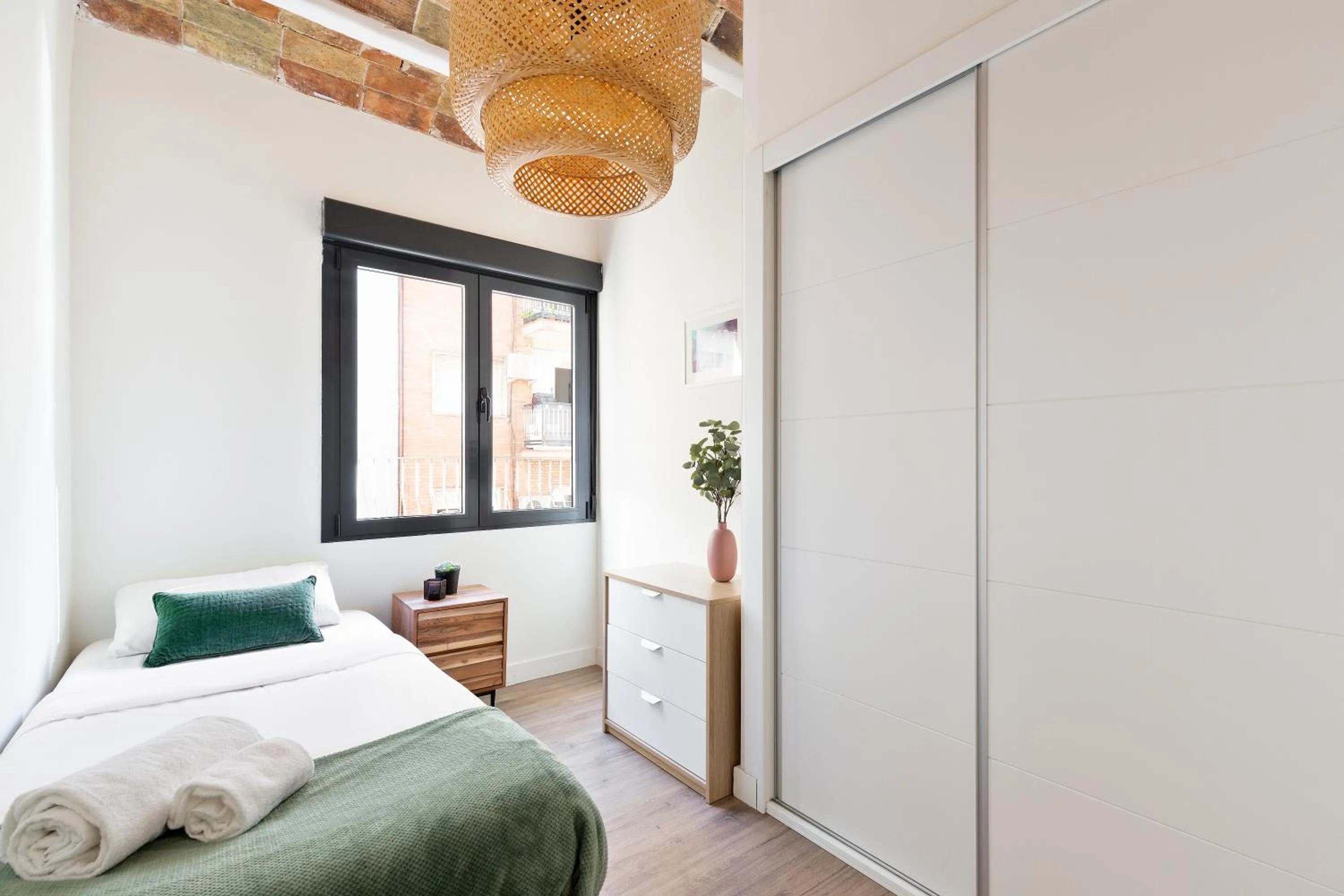 Bed in Modern Catalan Apartments by Olala Homes