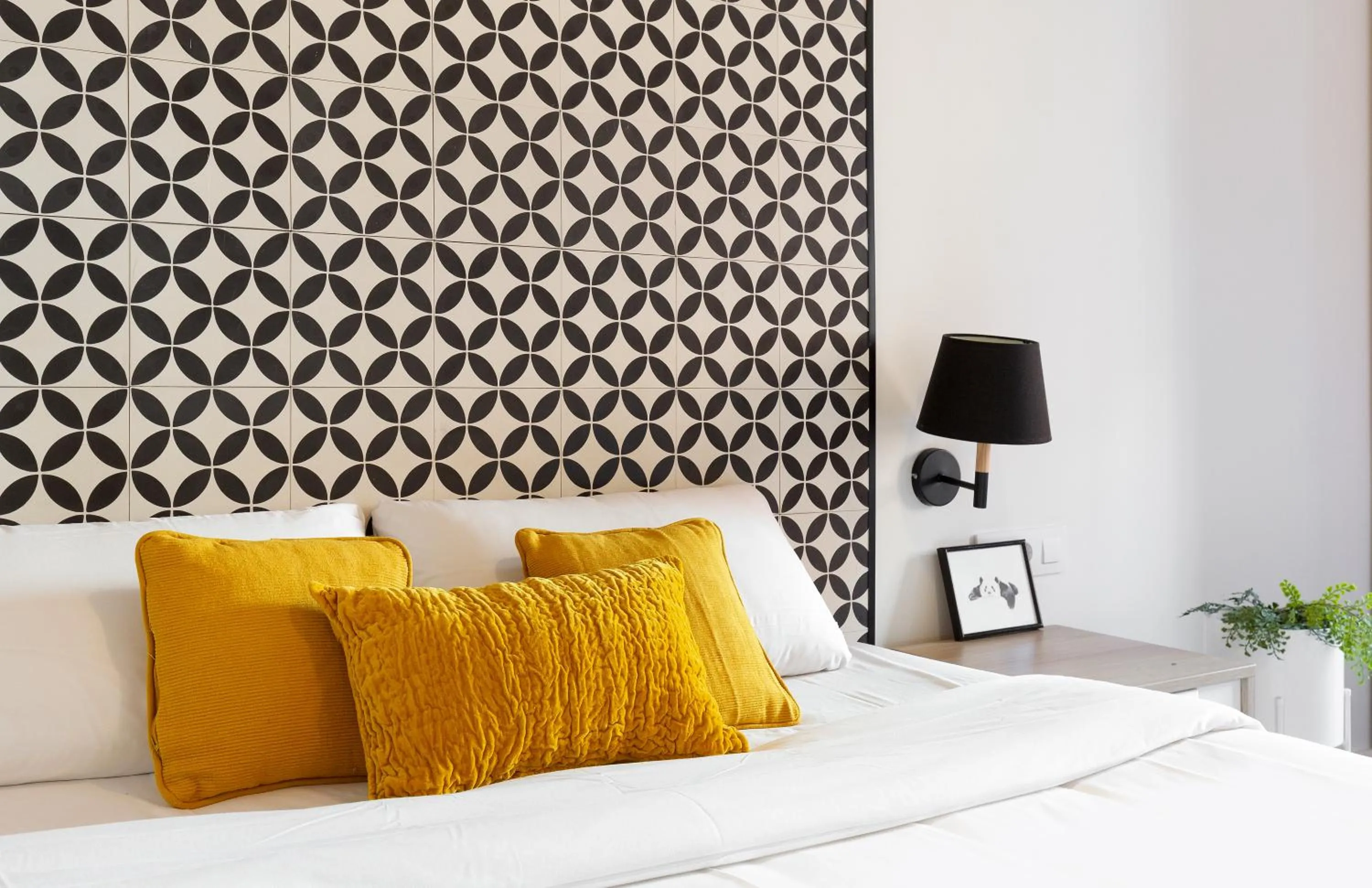 Bed in Modern Catalan Apartments by Olala Homes