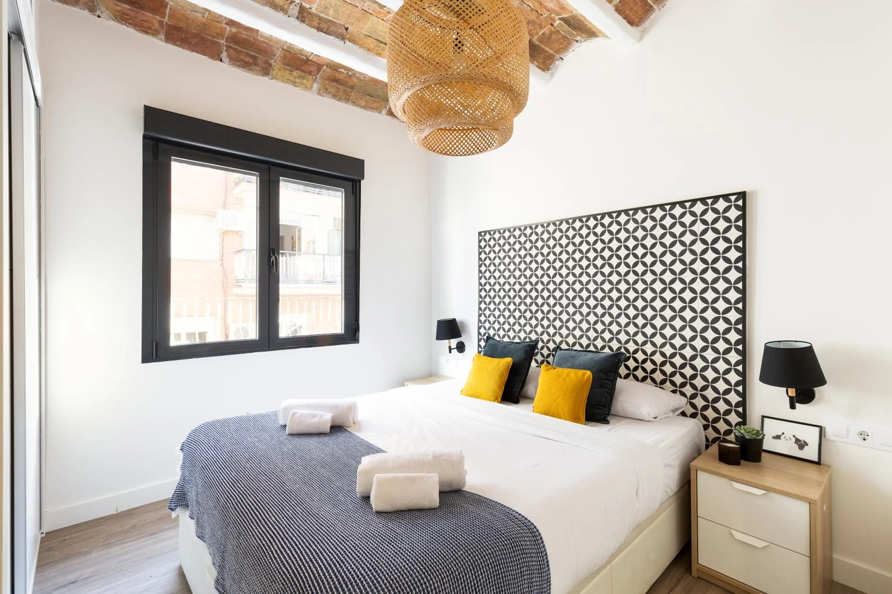Bed in Modern Catalan Apartments by Olala Homes