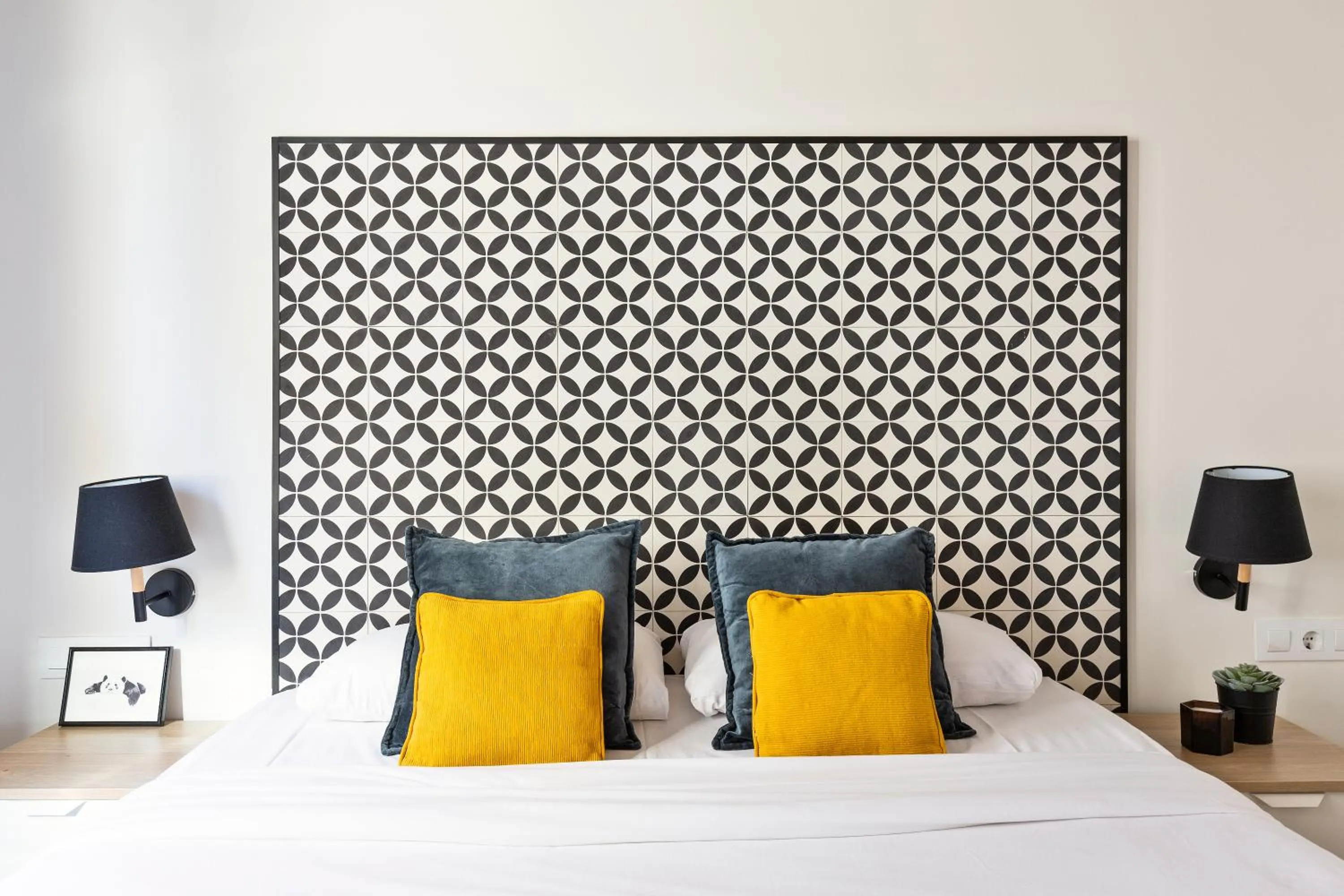 Decorative detail, Bed in Modern Catalan Apartments by Olala Homes